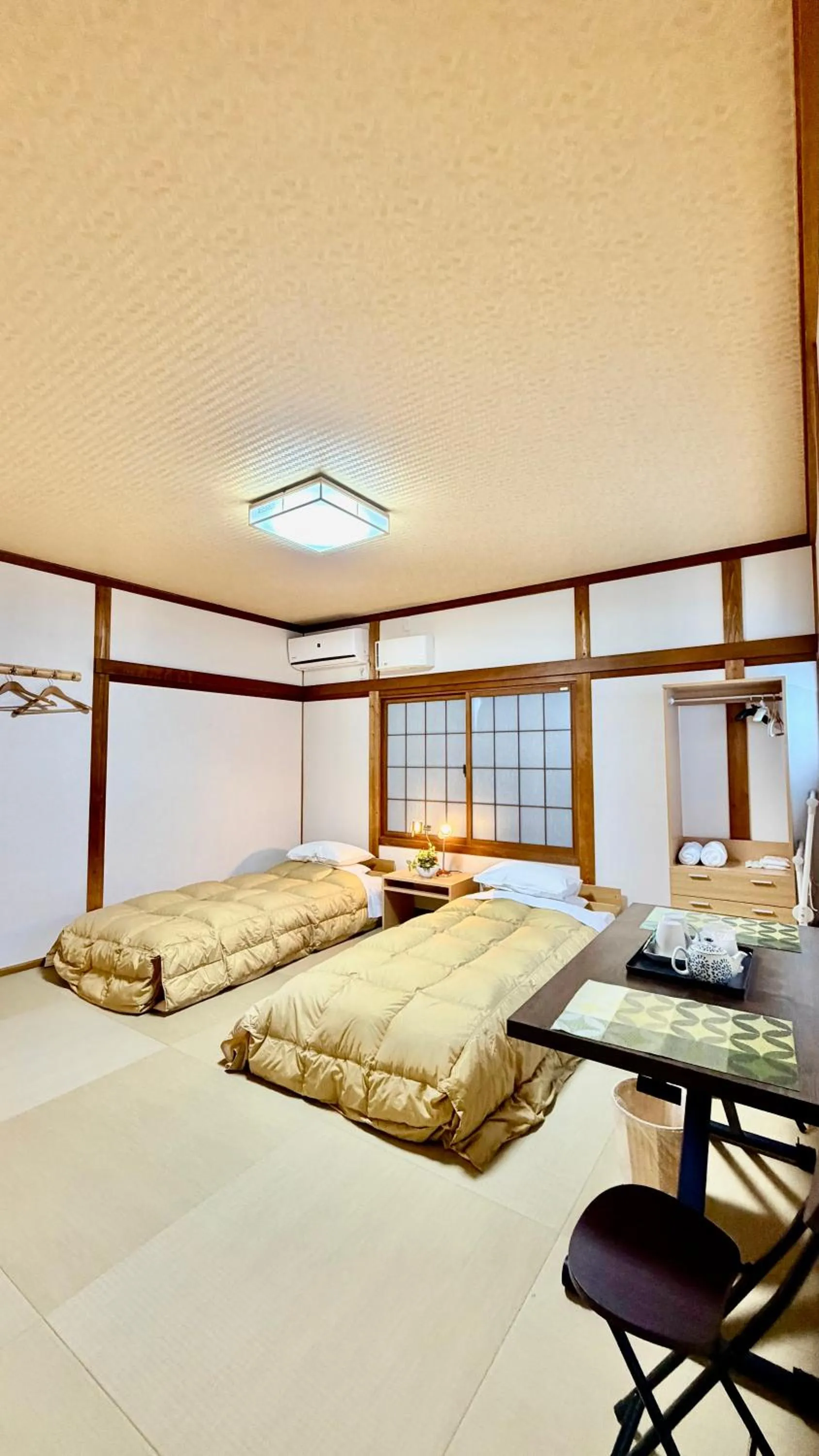 Bed in Tabist International Hotel Kaike