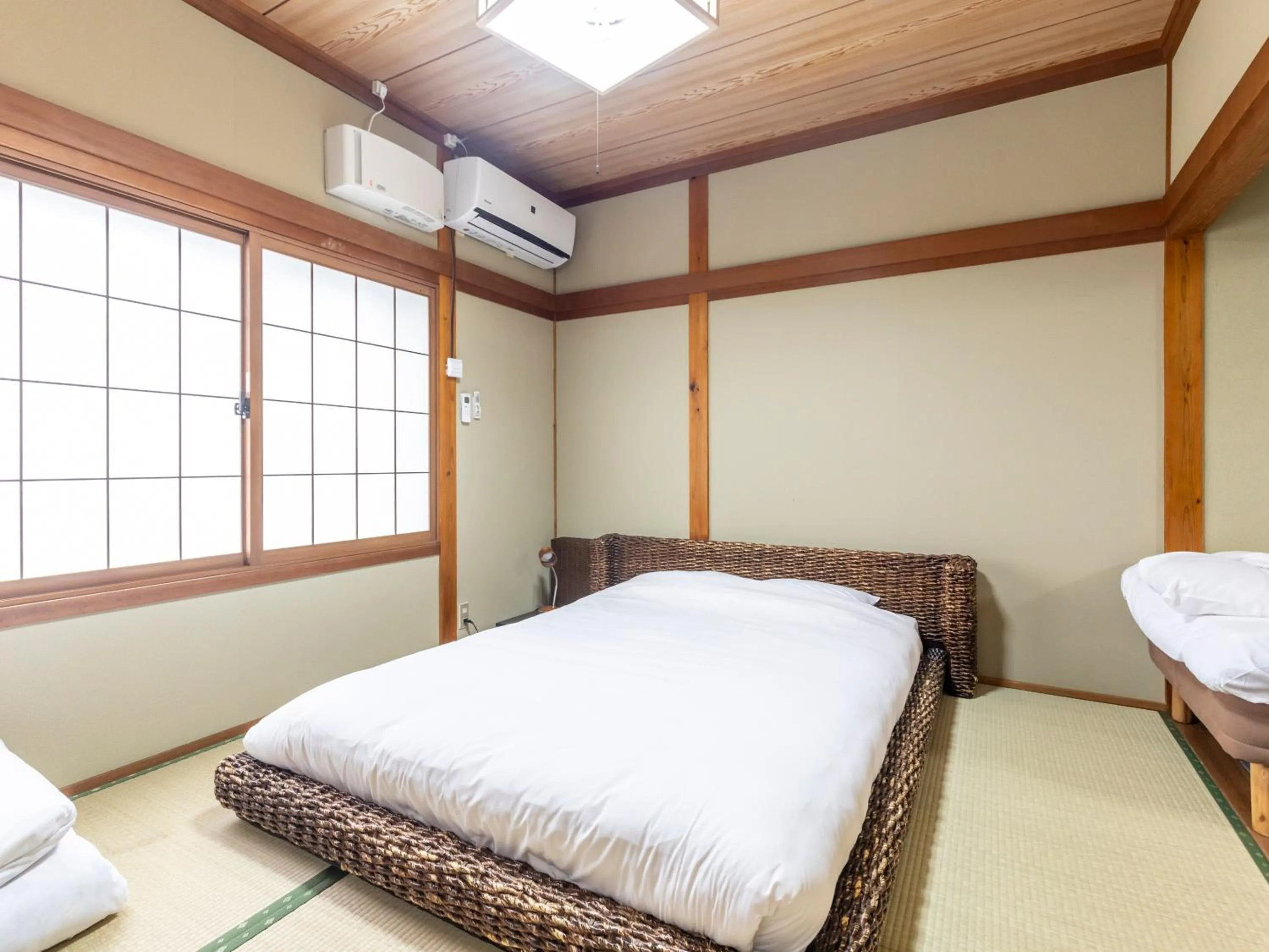 Bed in Tabist International Hotel Kaike