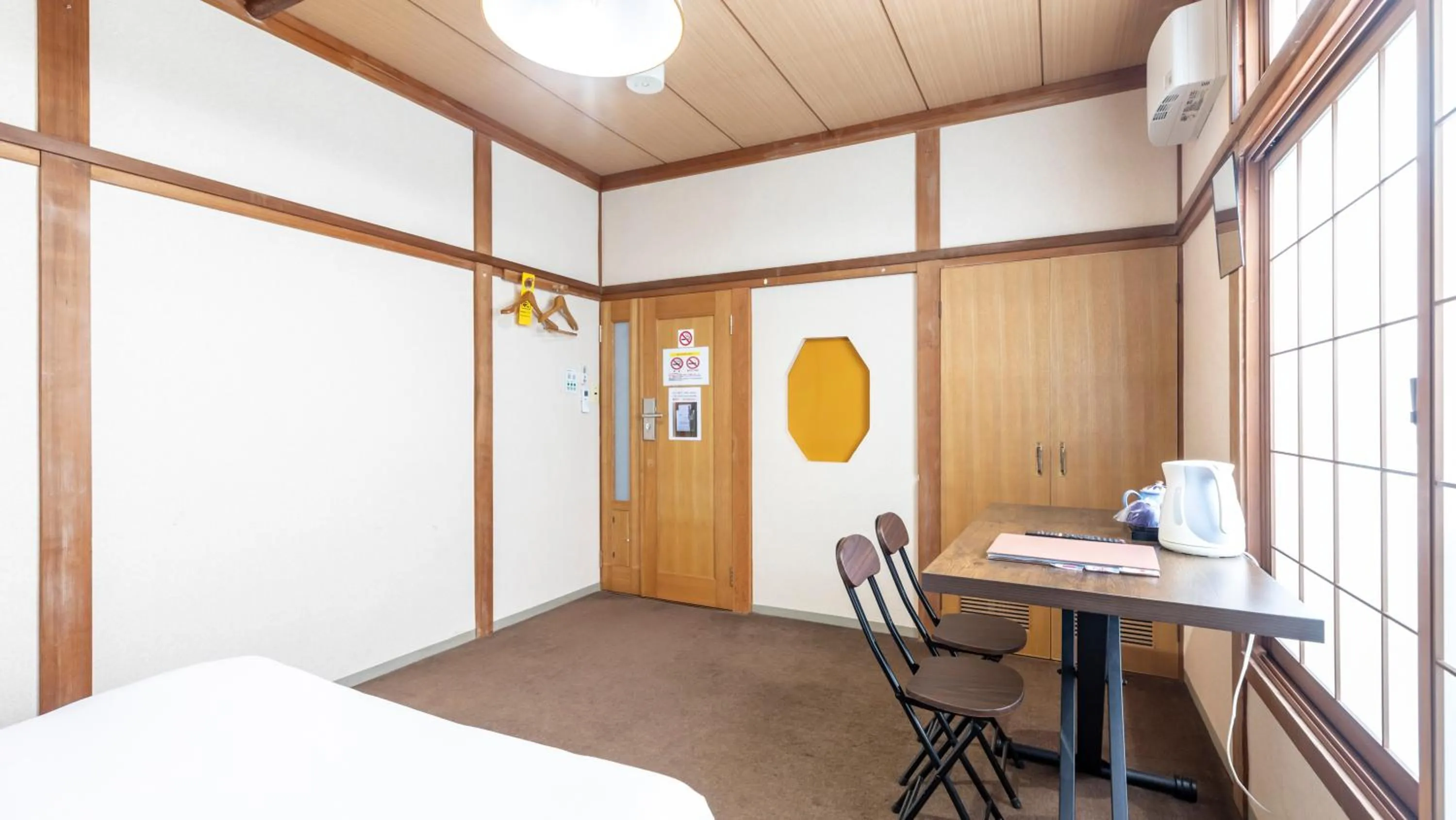 Bed in Tabist International Hotel Kaike