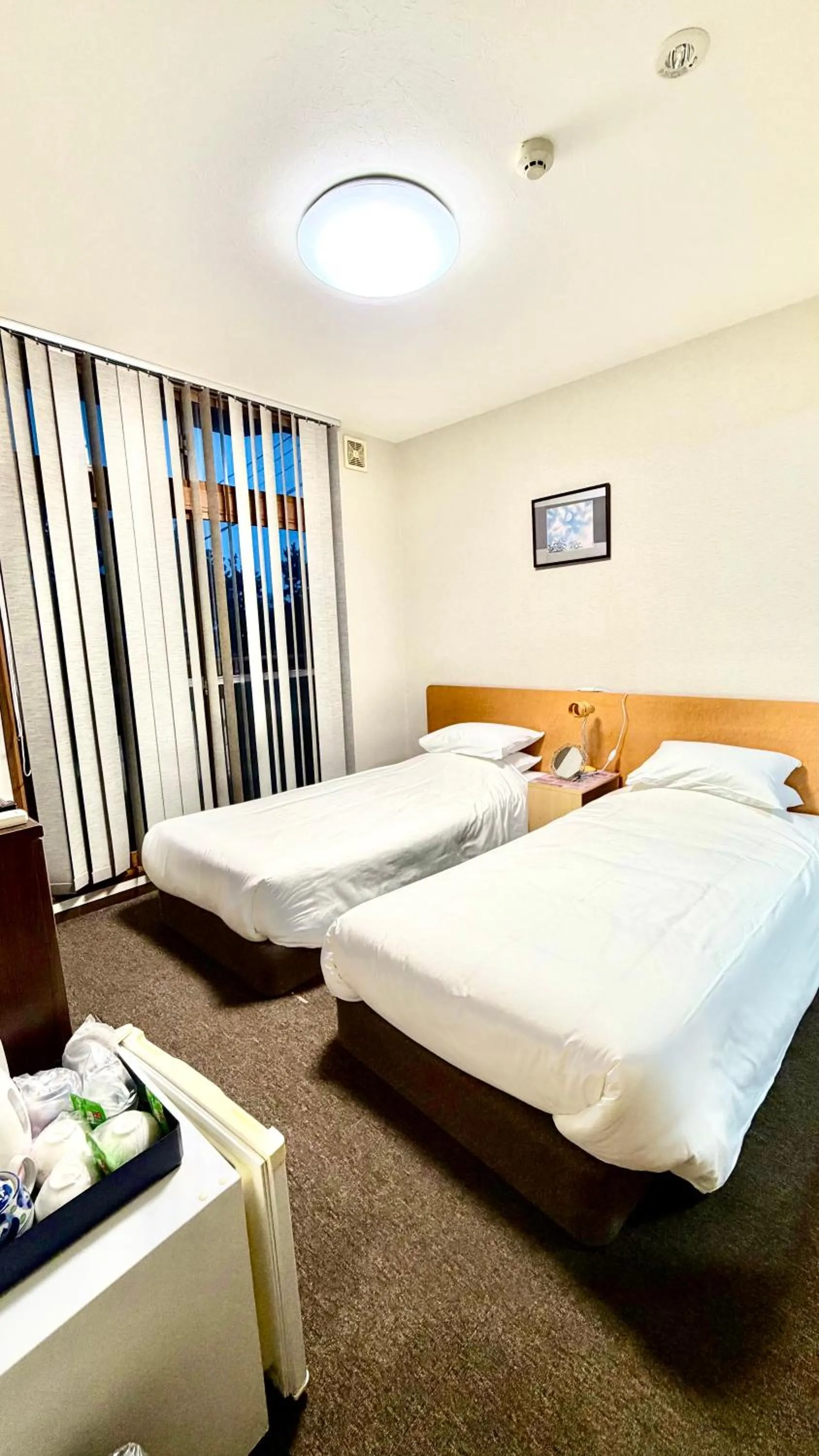 Bed in Tabist International Hotel Kaike