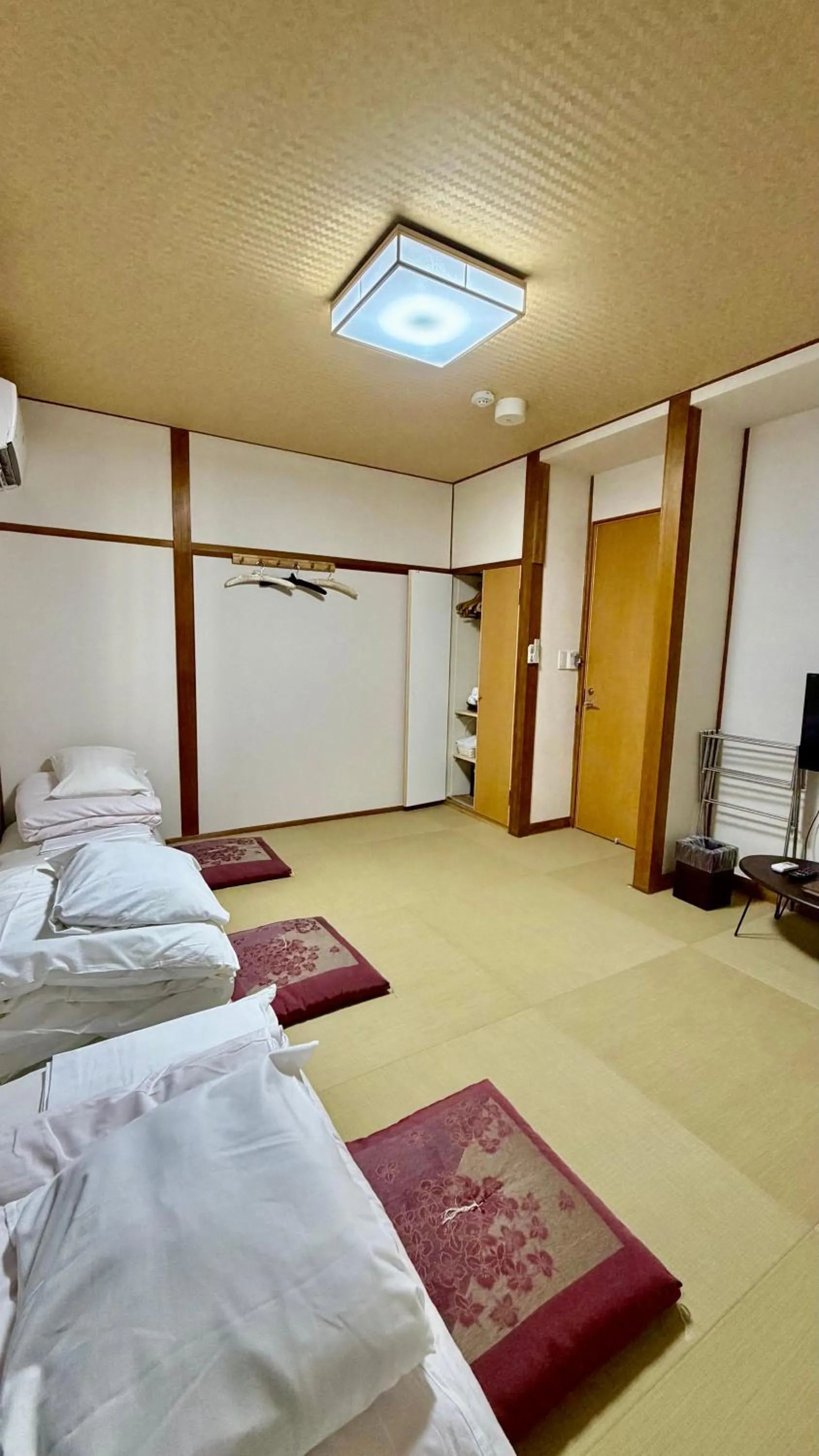 Bed in Tabist International Hotel Kaike