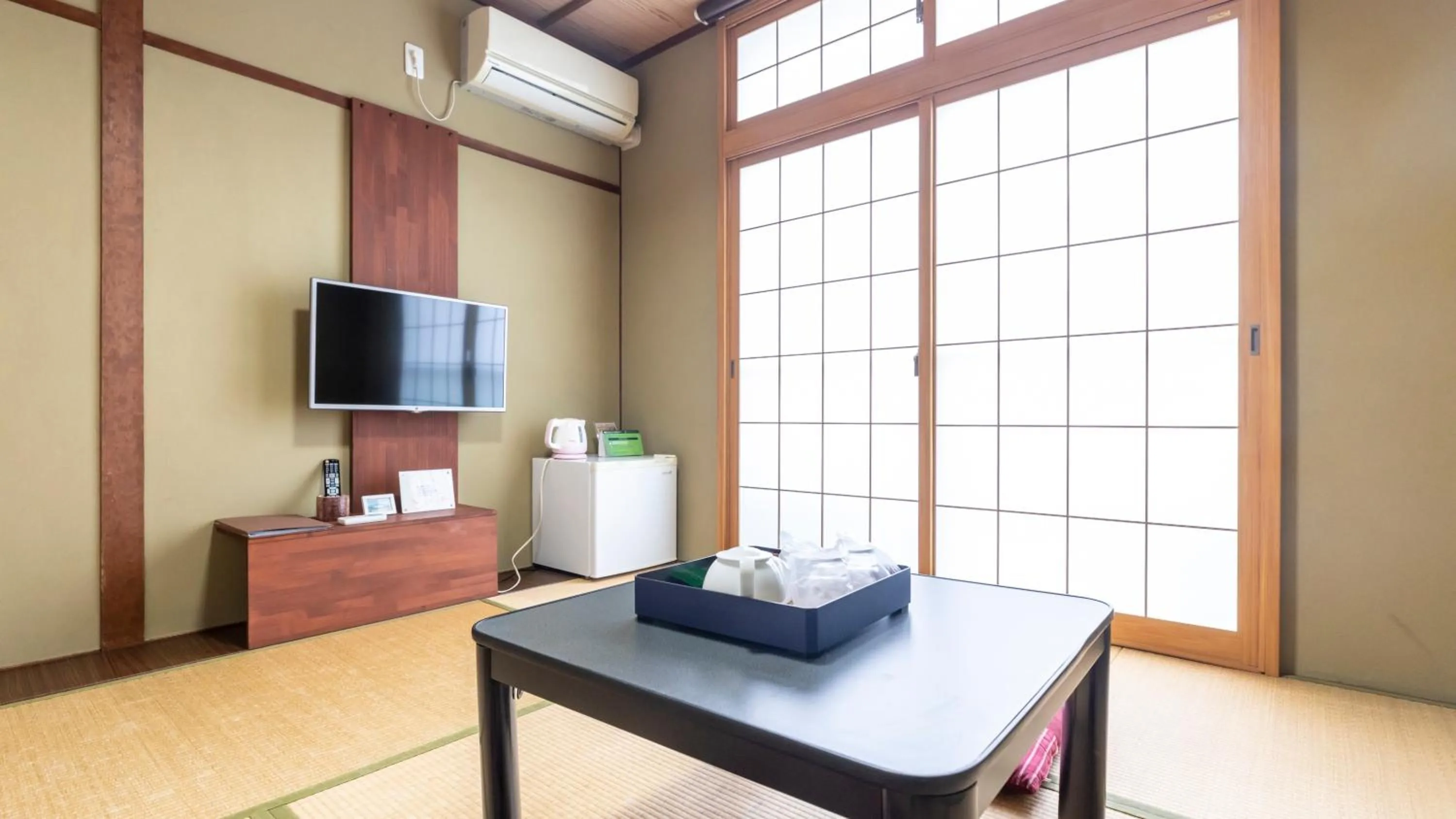 Bed in Tabist International Hotel Kaike