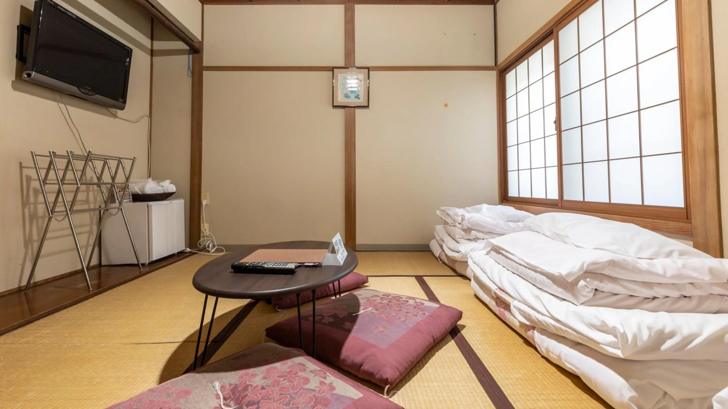 Bed in Tabist International Hotel Kaike