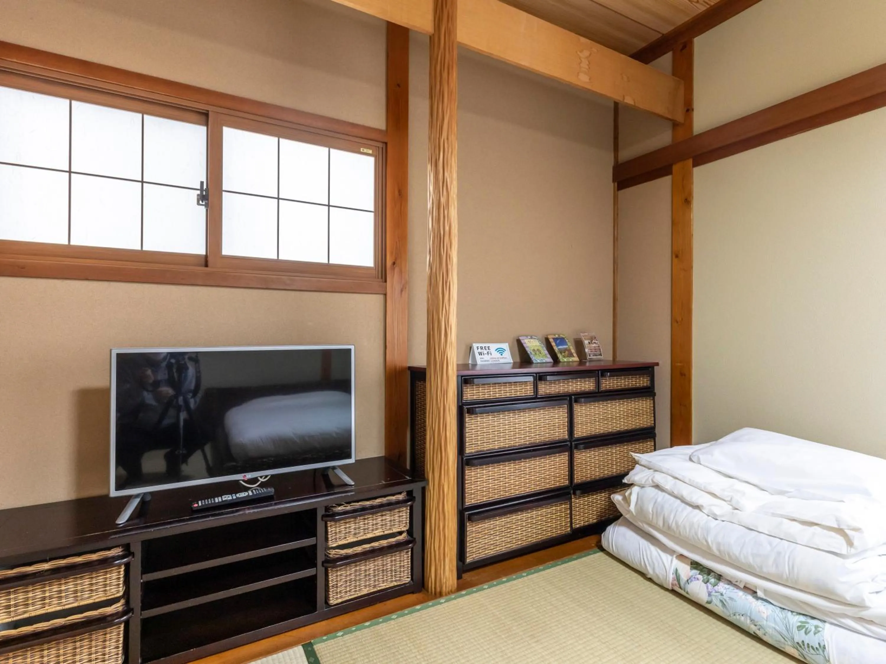 Bed in Tabist International Hotel Kaike