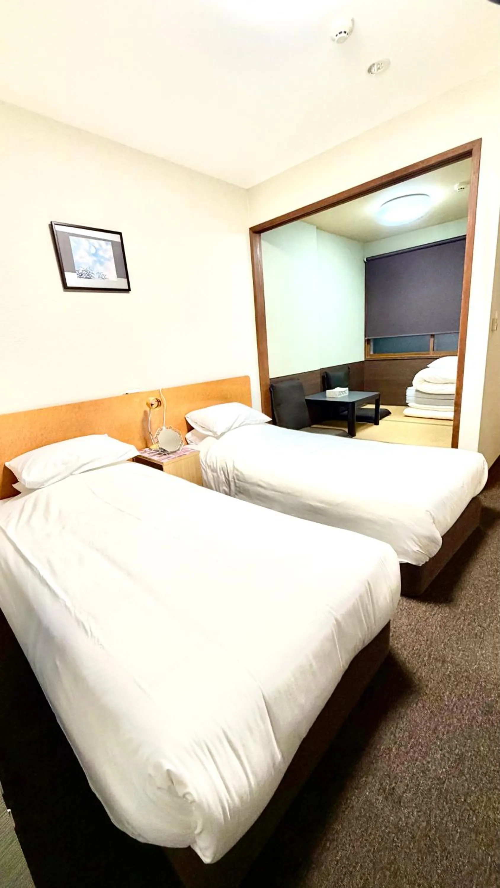 Bed in Tabist International Hotel Kaike