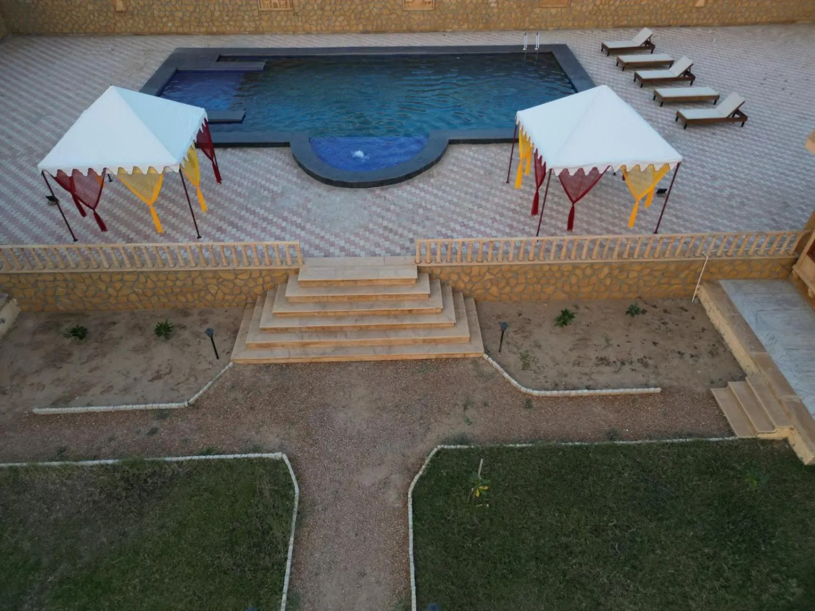 Swimming pool in sand castle resort