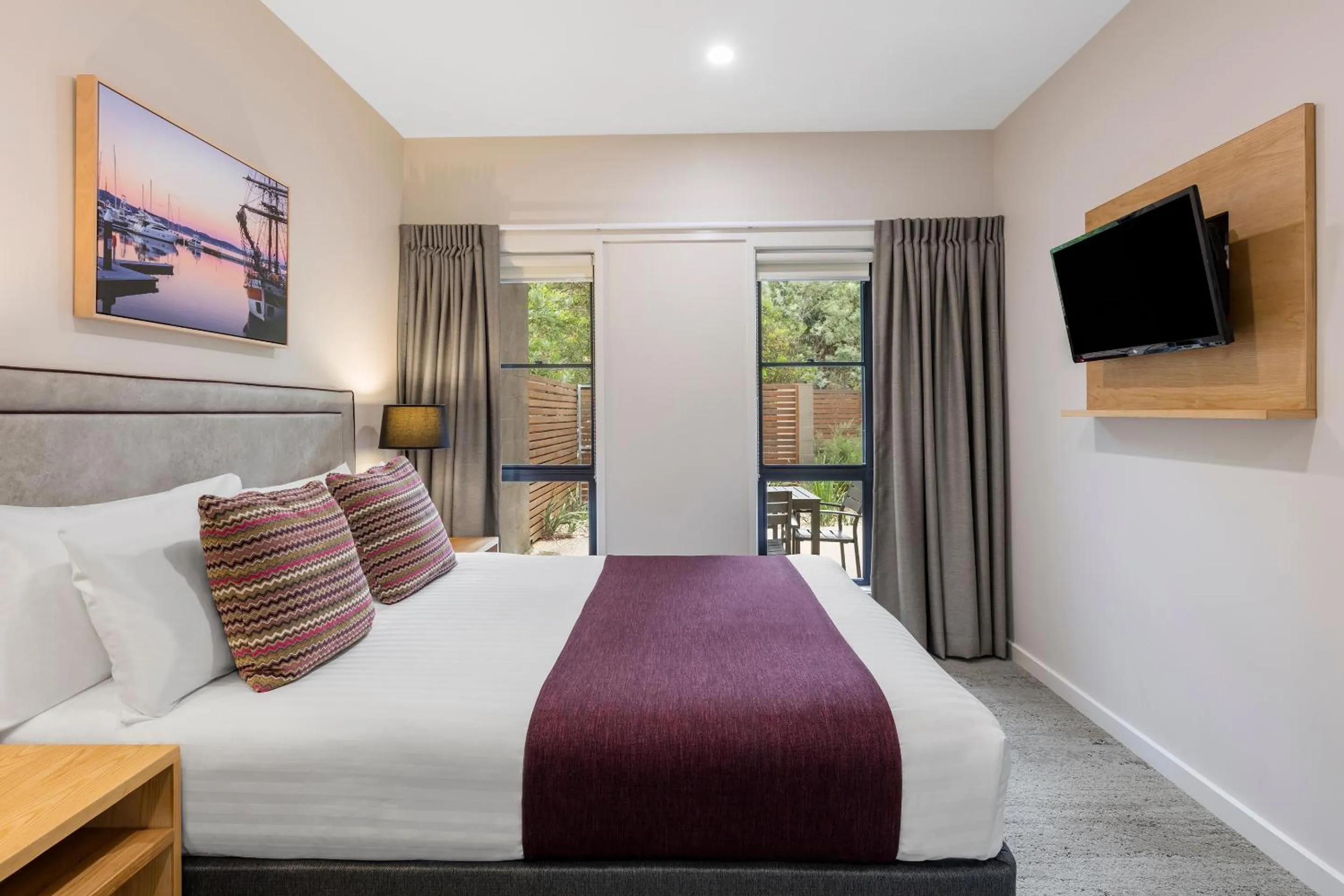 Communal lounge/ TV room, Bed in Club Wyndham Seven Mile Beach, Trademark Collection by Wyndham