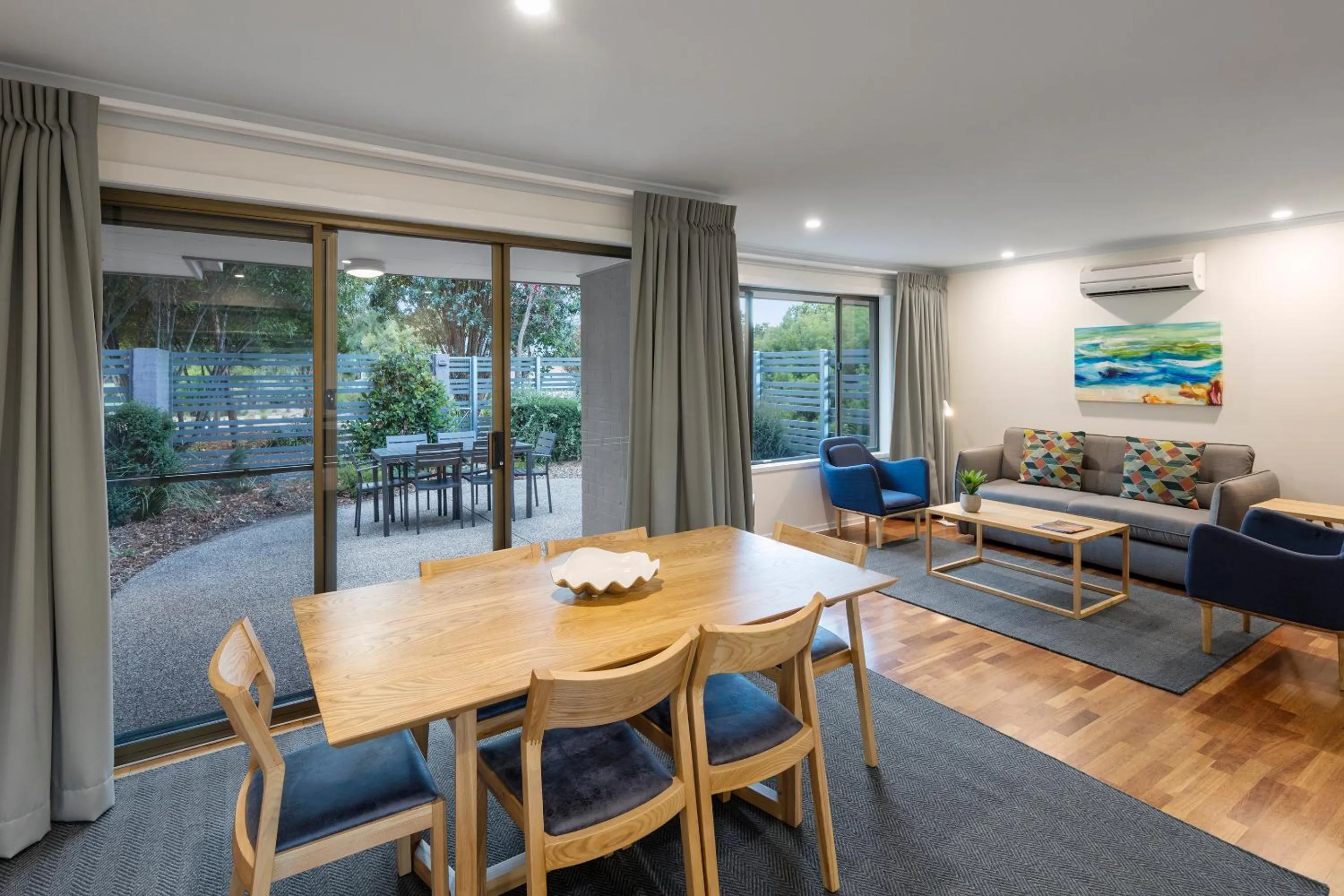 Living room in Club Wyndham Seven Mile Beach, Trademark Collection by Wyndham