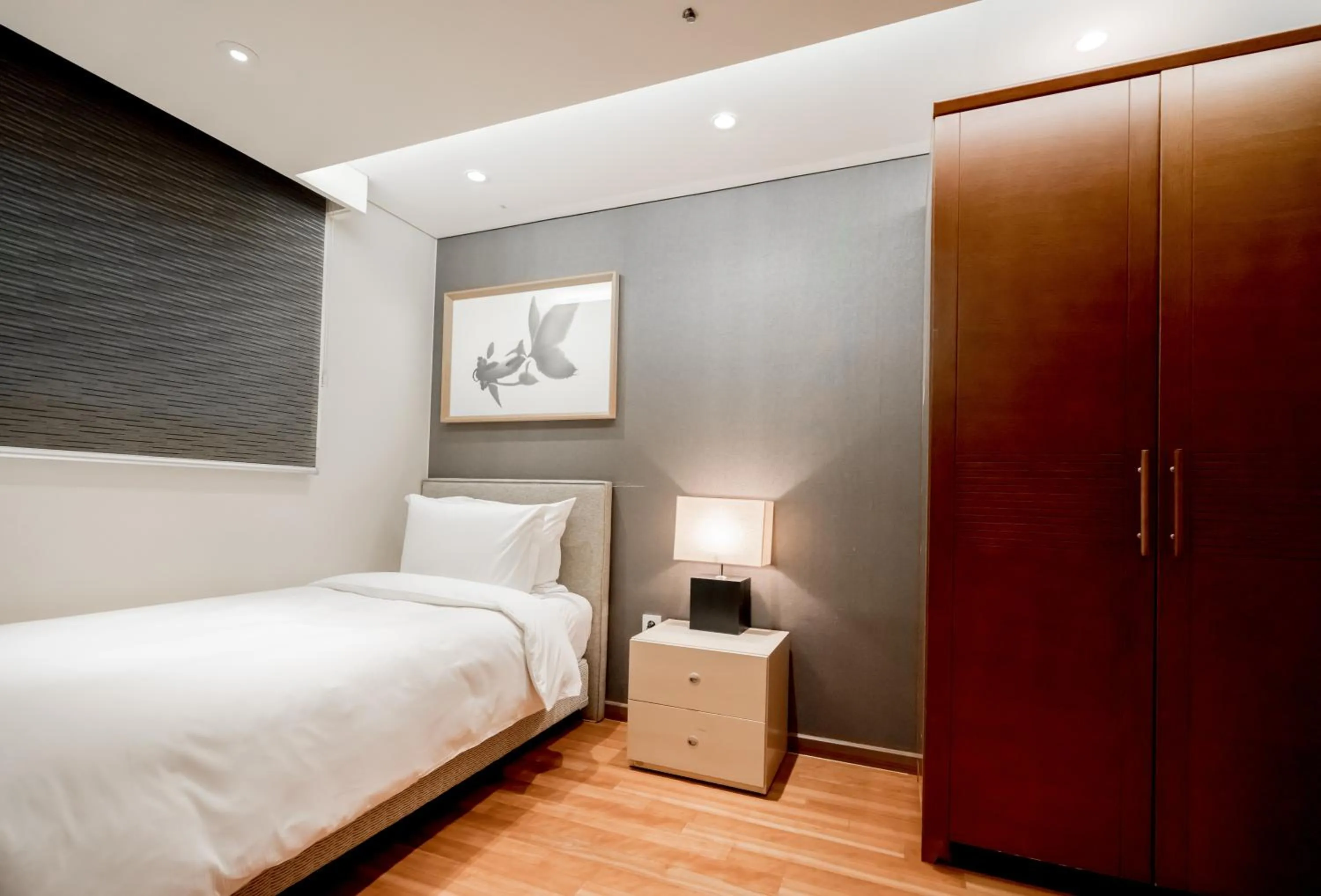 Bed in Oriens Hotel & Residences Myeongdong