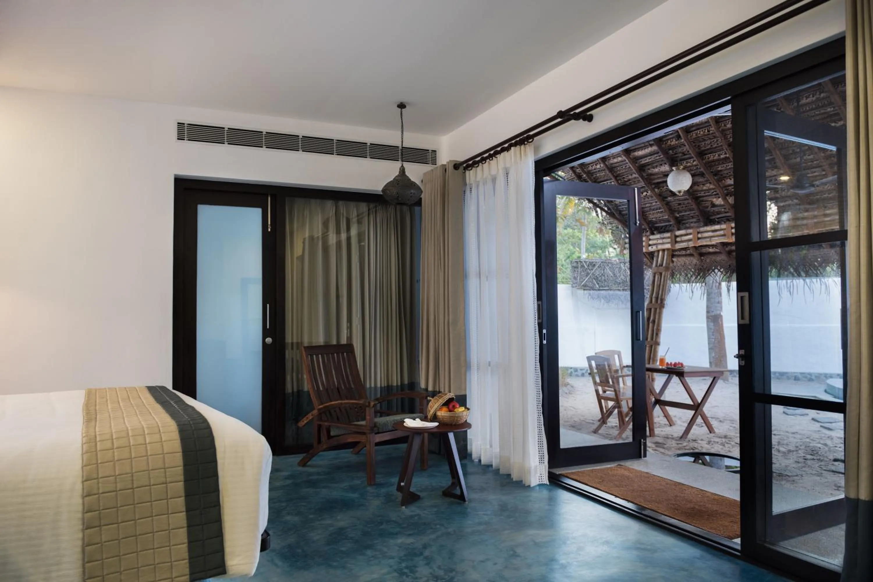 Bedroom in Xandari Pearl Beach Resort
