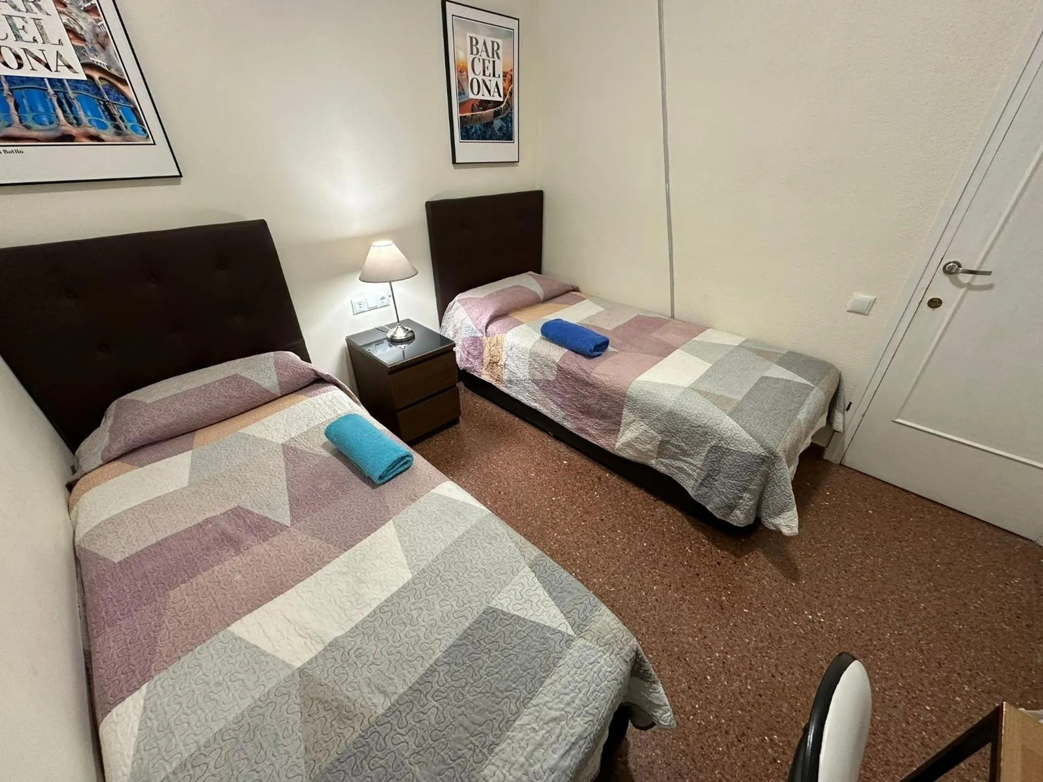 Bed in Viladomat Rooms