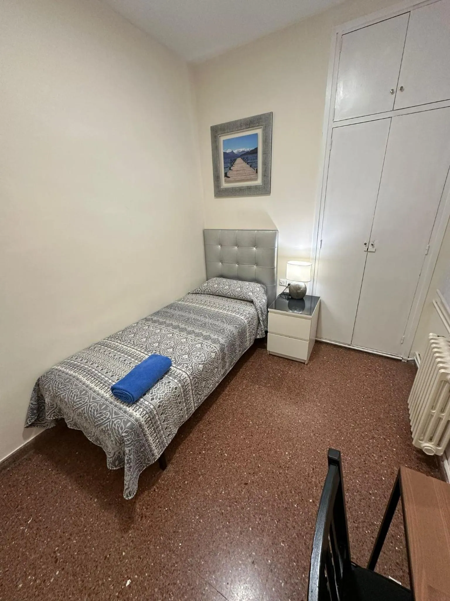 Bed in Viladomat Rooms