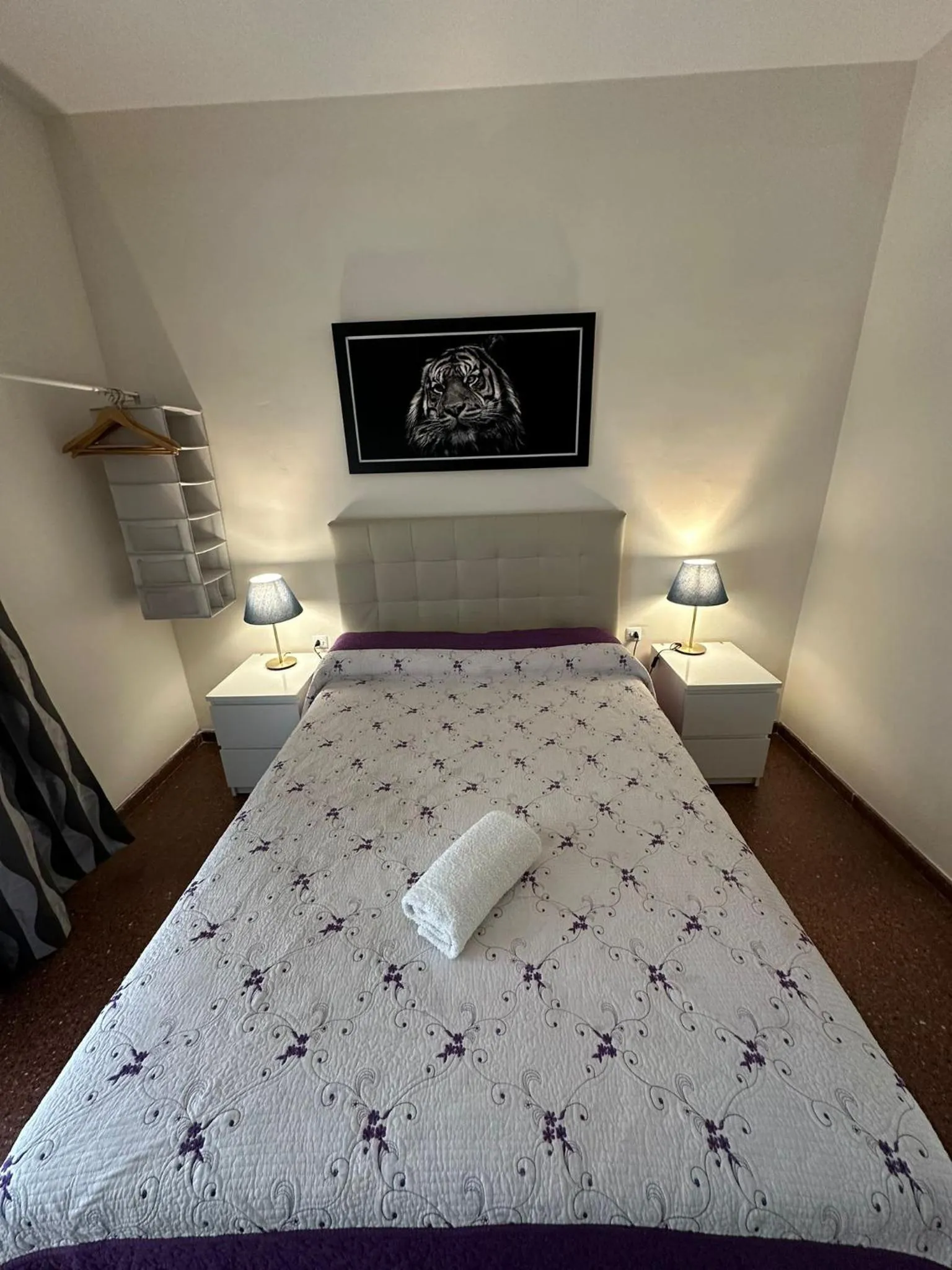 Bed in Viladomat Rooms