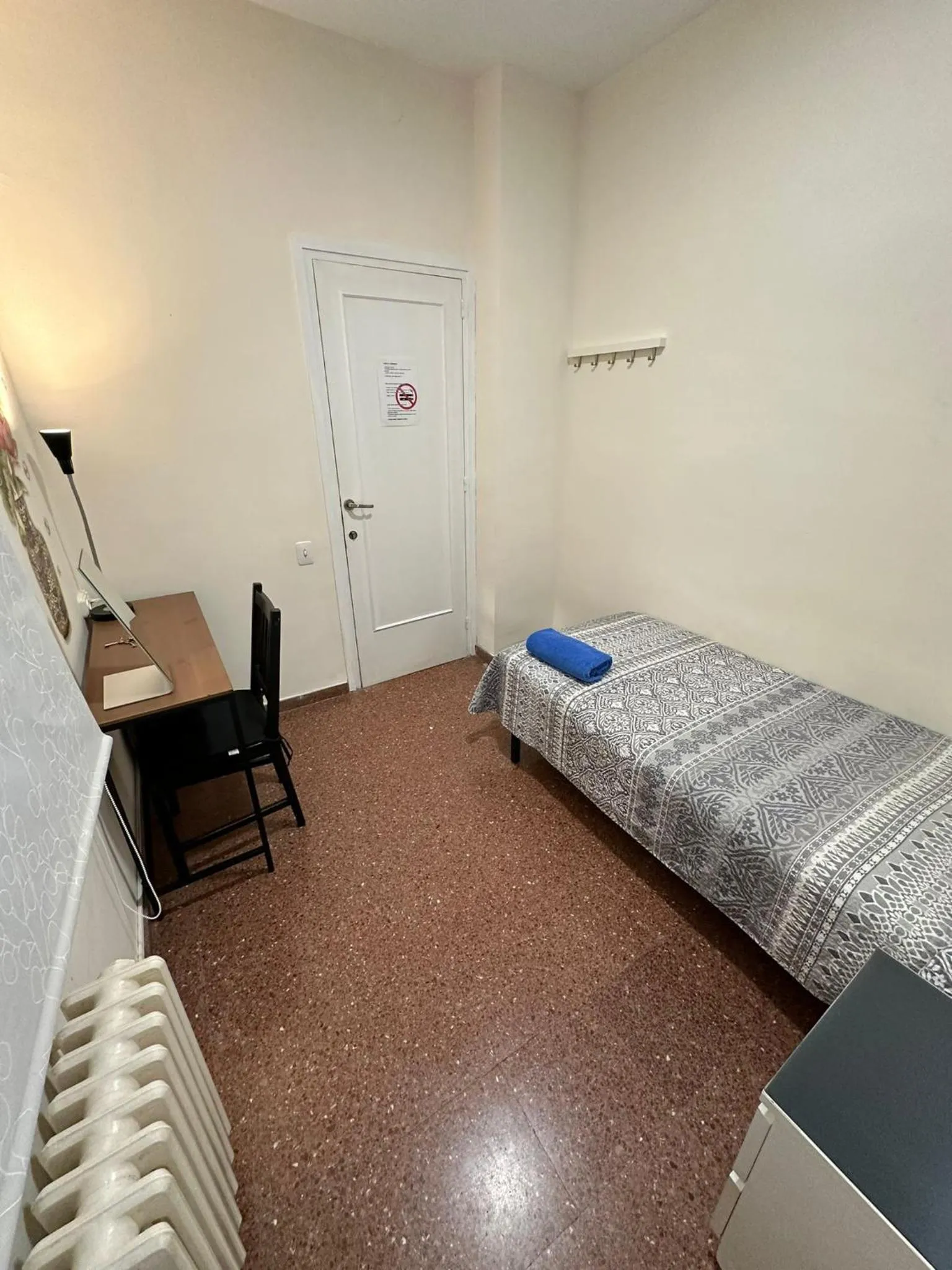 Bed in Viladomat Rooms