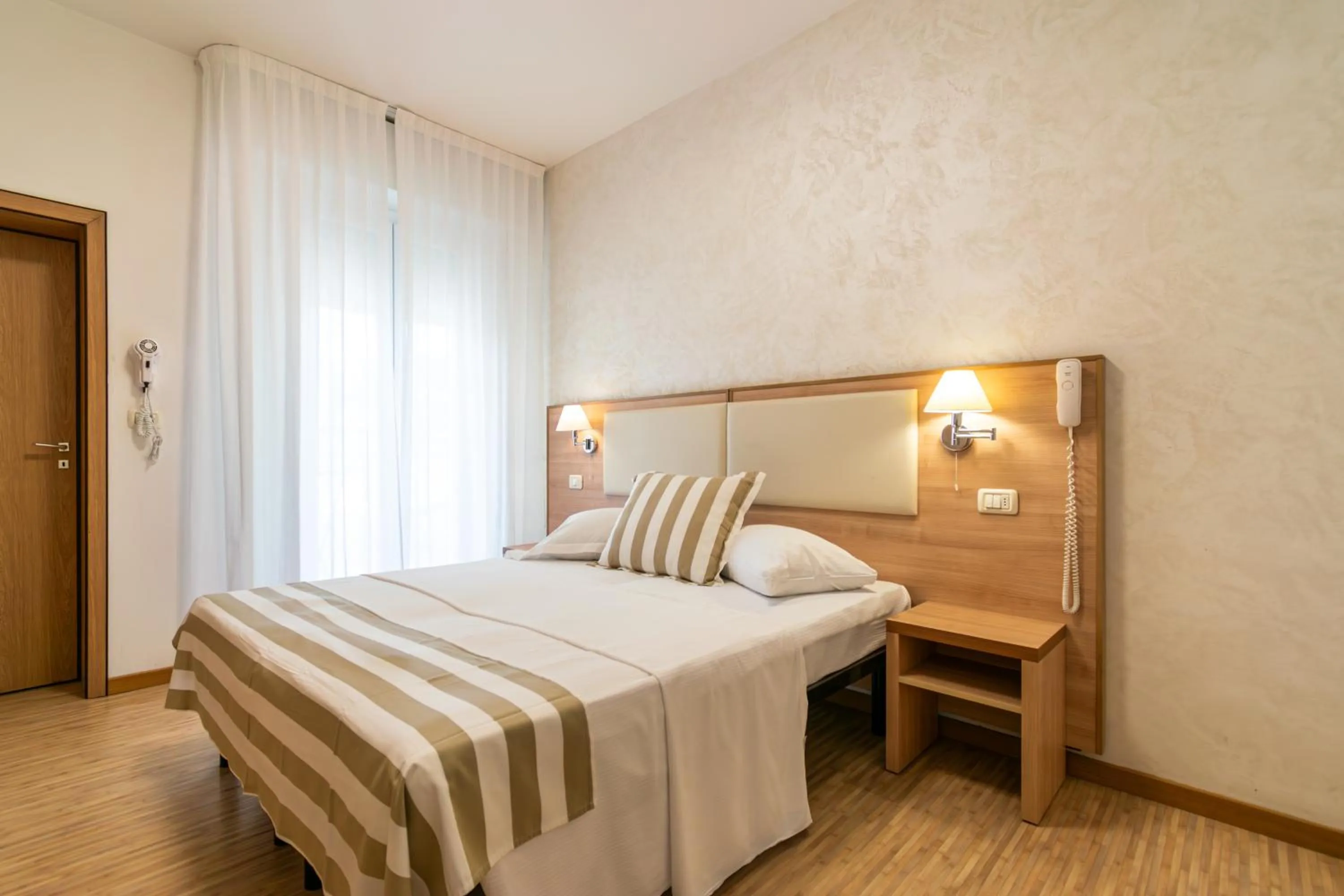 Bed in Hotel Losanna