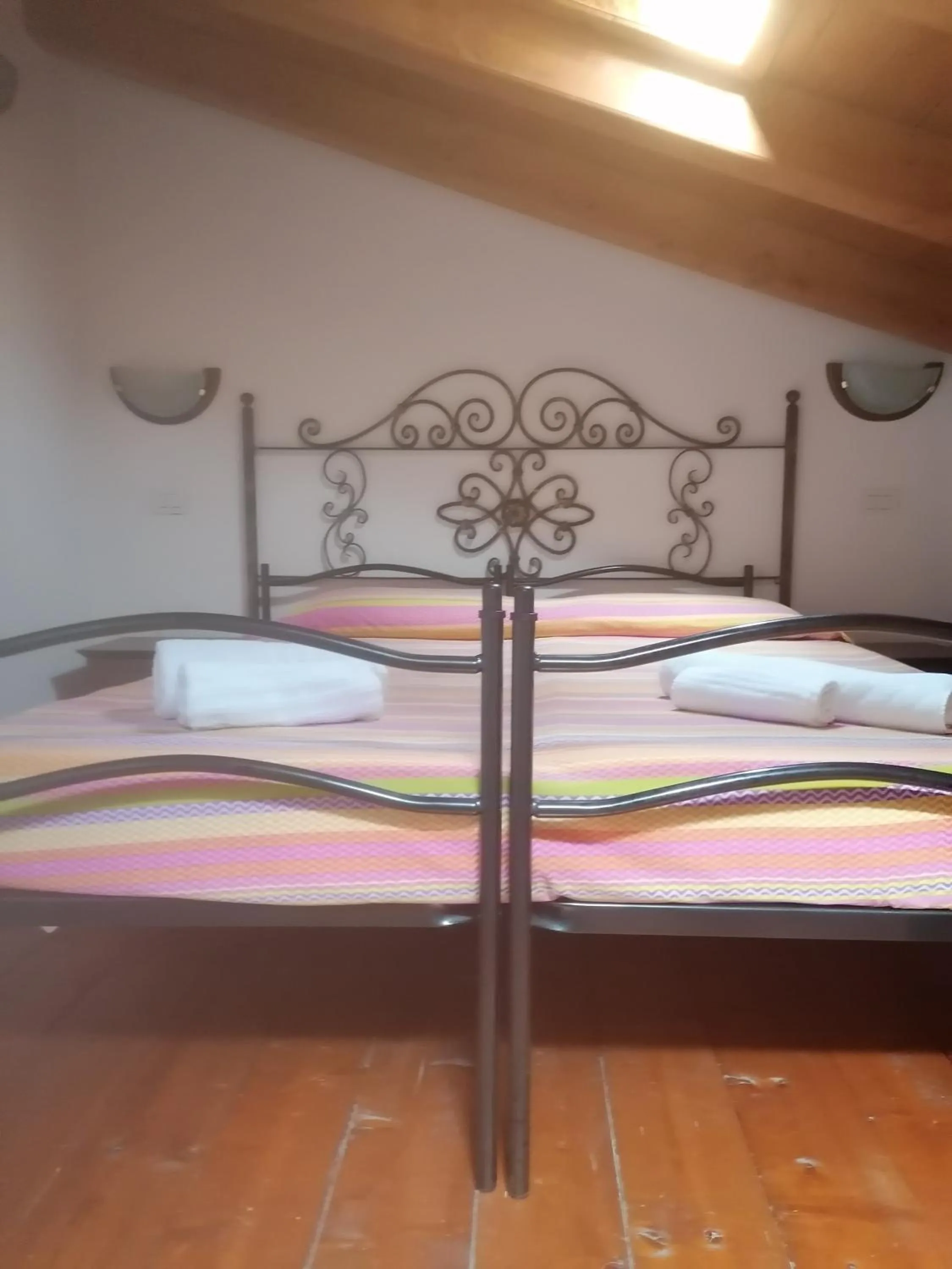 Bed in Su Ghindalu Guesthouse