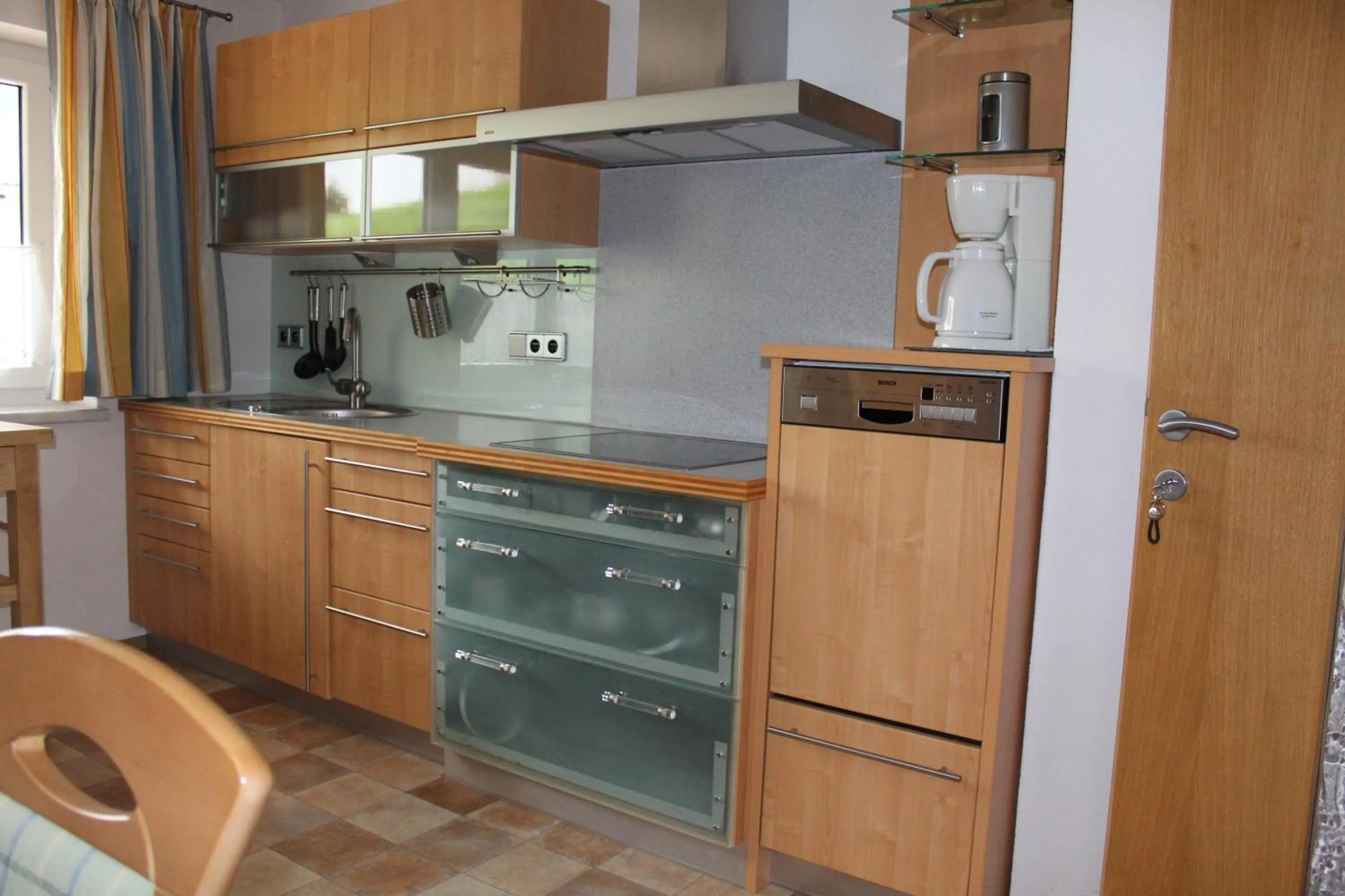 Kitchen or kitchenette in Ferienwohnung Stuibenfall