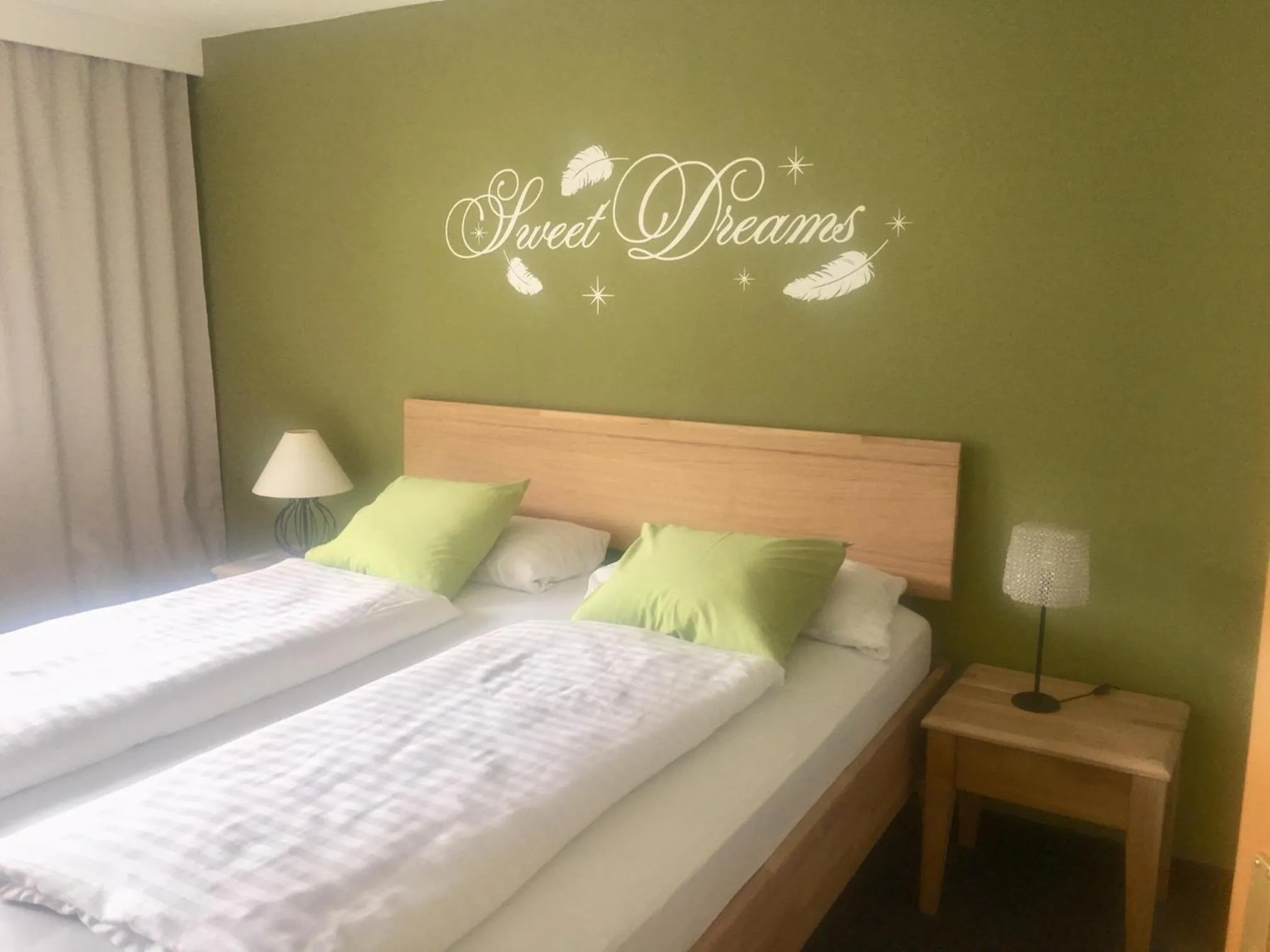 Bed in Ferienwohnung Stuibenfall