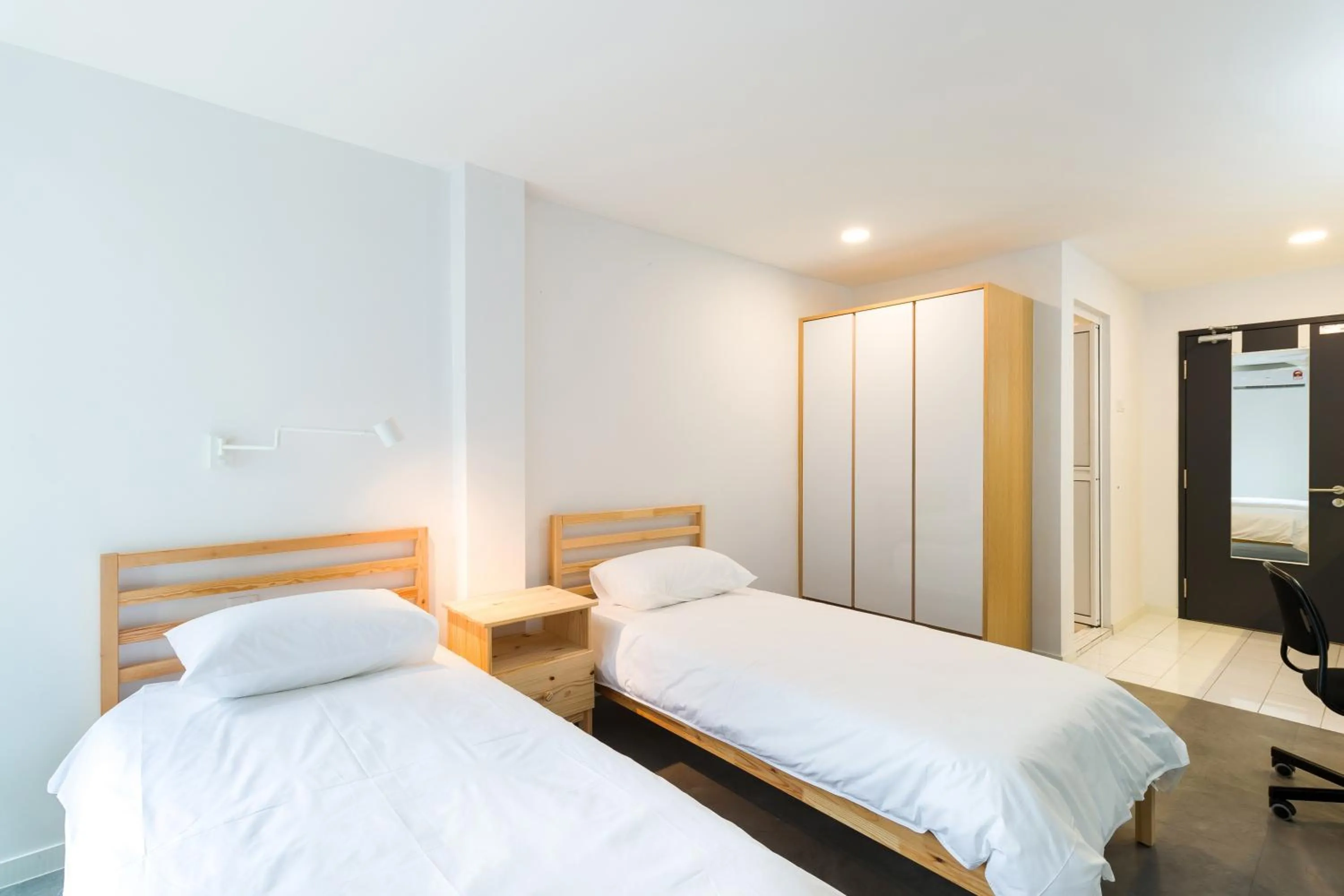 Bed in Upstairs Downstairs CoLiving Kampung Pandan
