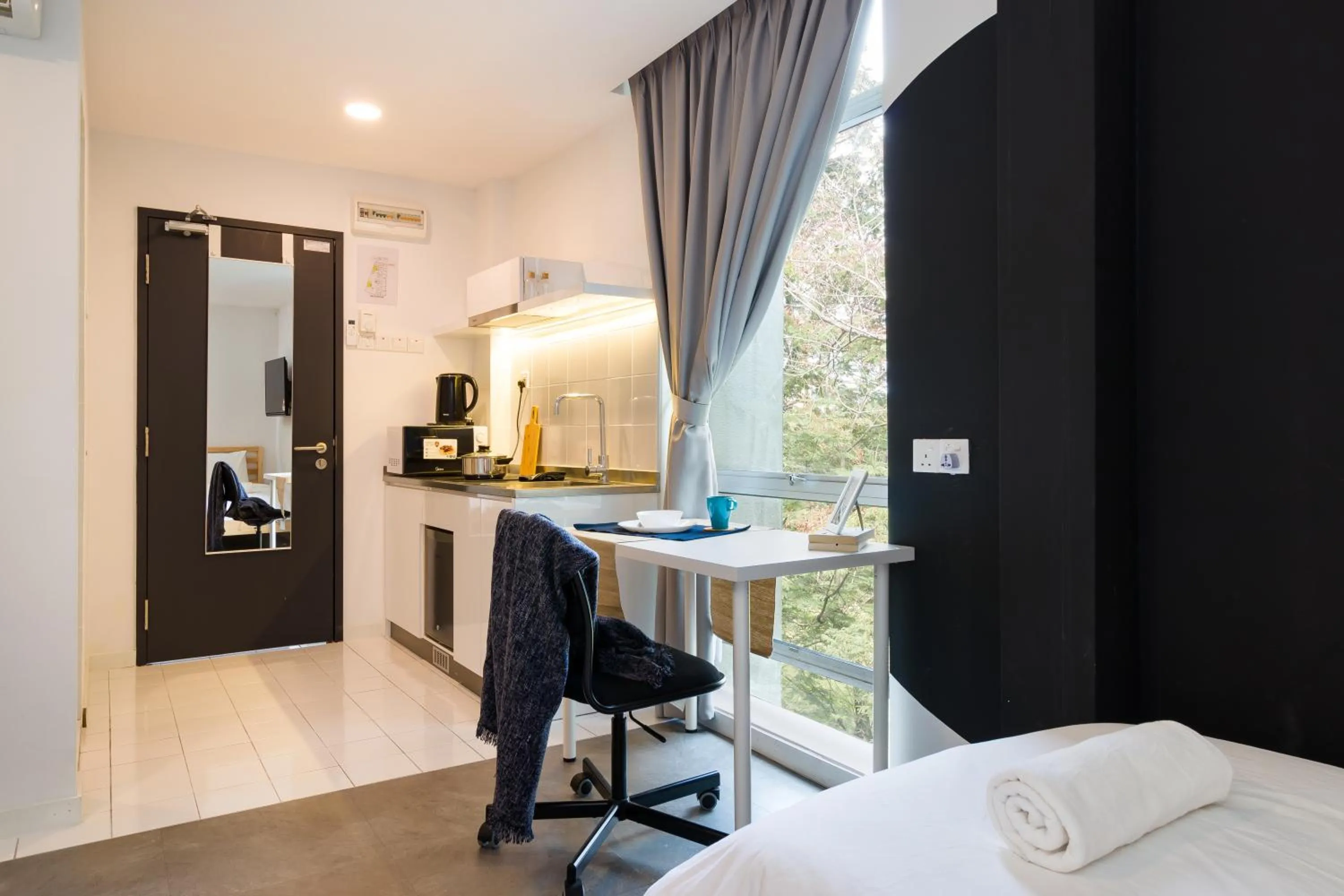 Bed in Upstairs Downstairs CoLiving Kampung Pandan