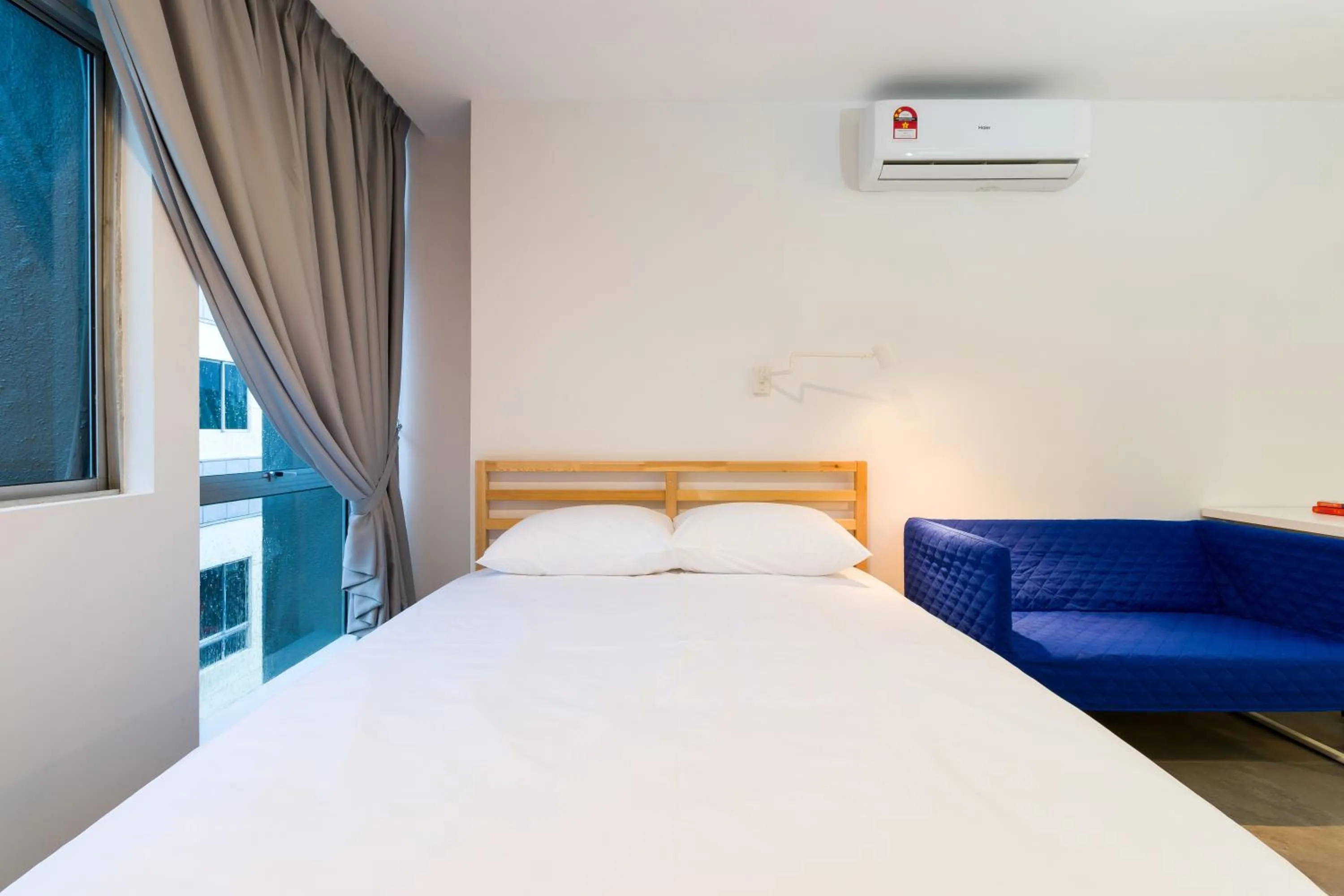 Bed in Upstairs Downstairs CoLiving Kampung Pandan
