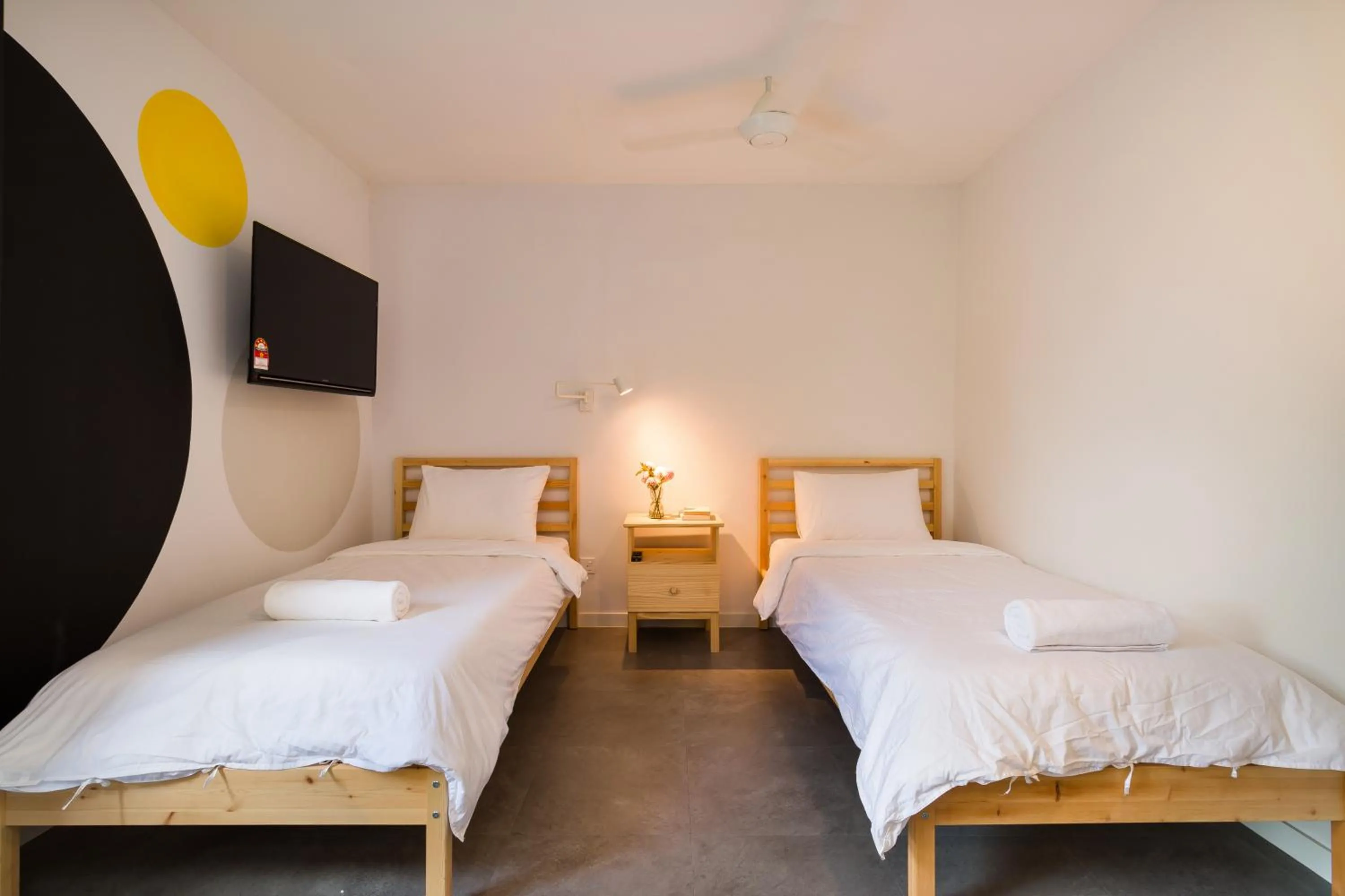 Bed in Upstairs Downstairs CoLiving Kampung Pandan
