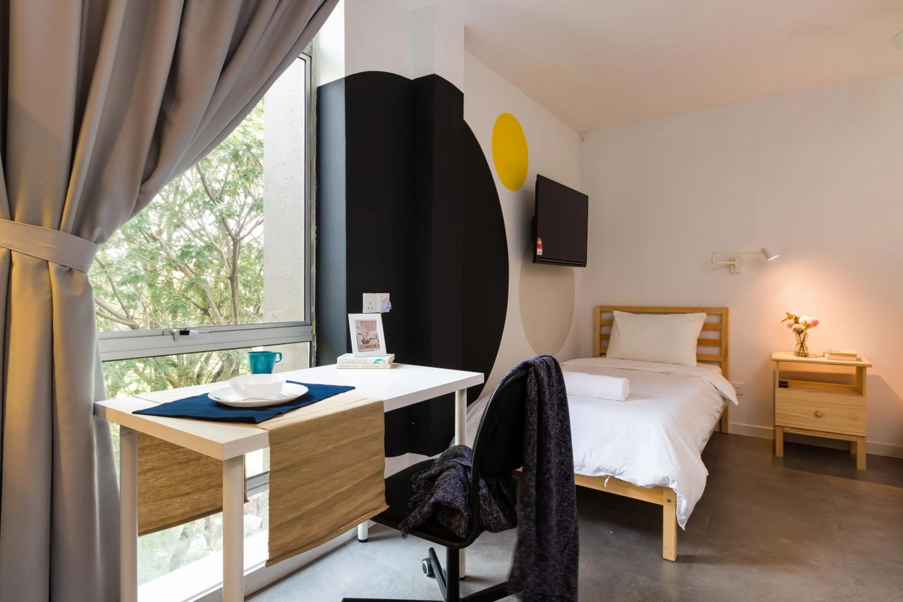 Bed in Upstairs Downstairs CoLiving Kampung Pandan