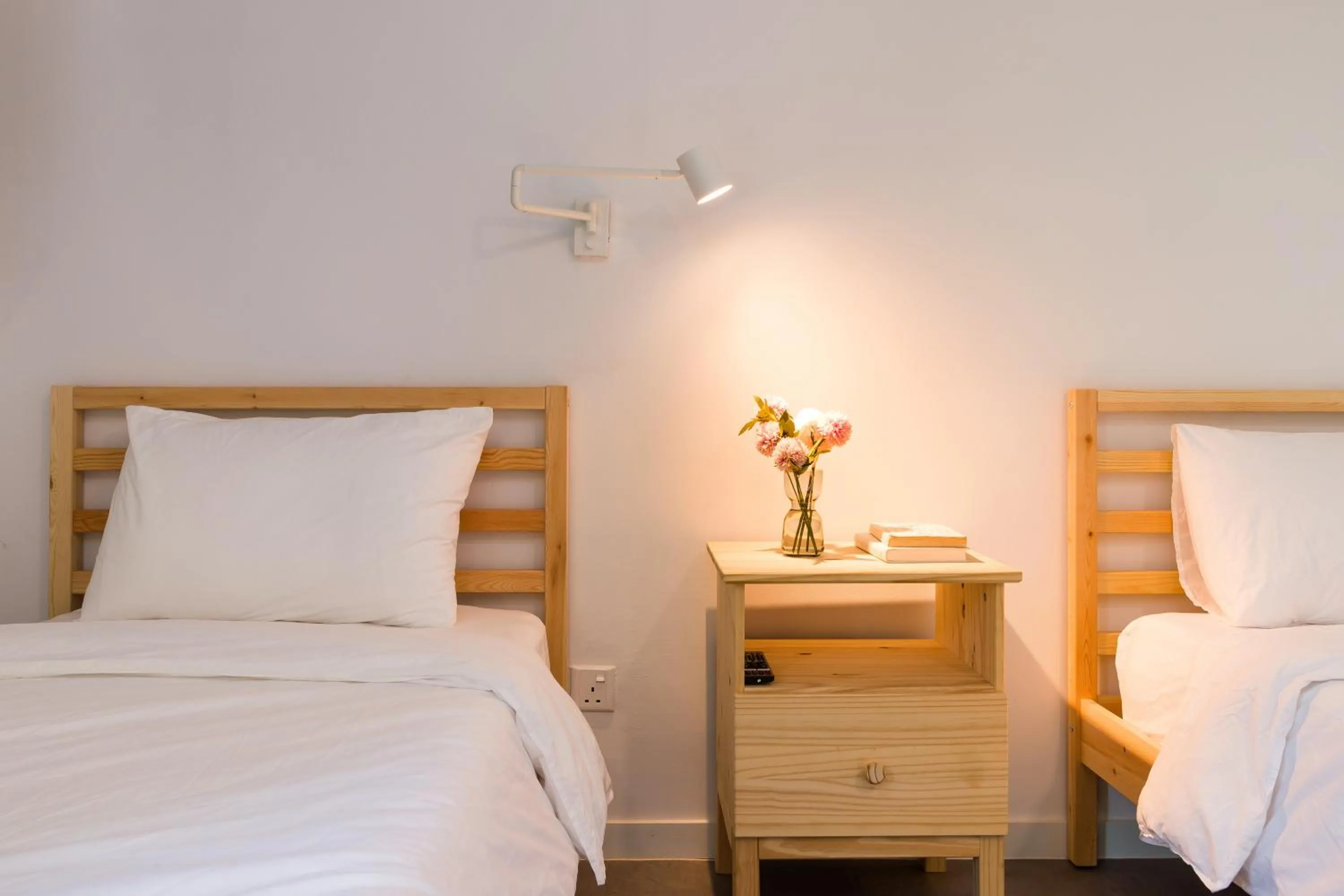 Bed in Upstairs Downstairs CoLiving Kampung Pandan