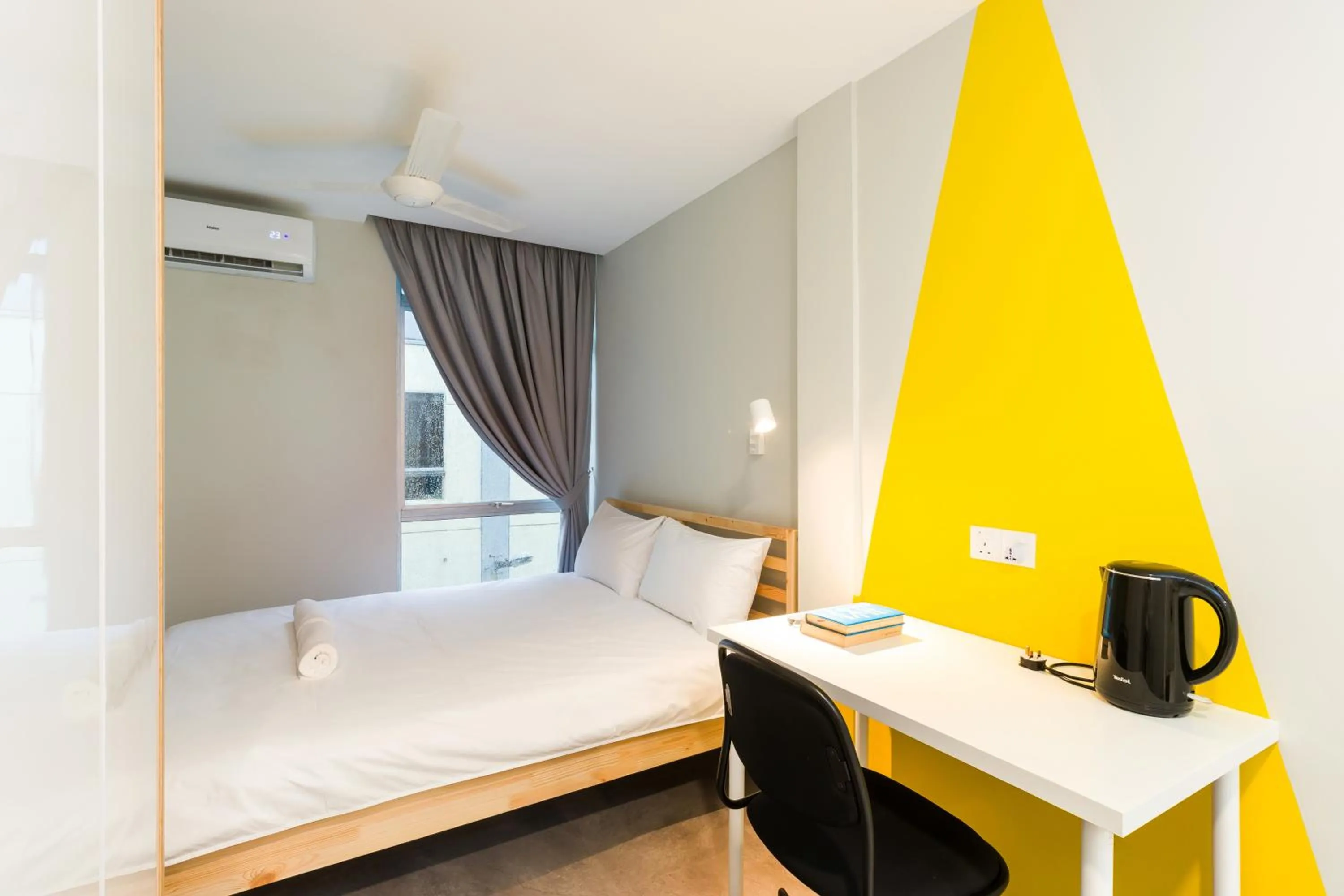 Bed in Upstairs Downstairs CoLiving Kampung Pandan