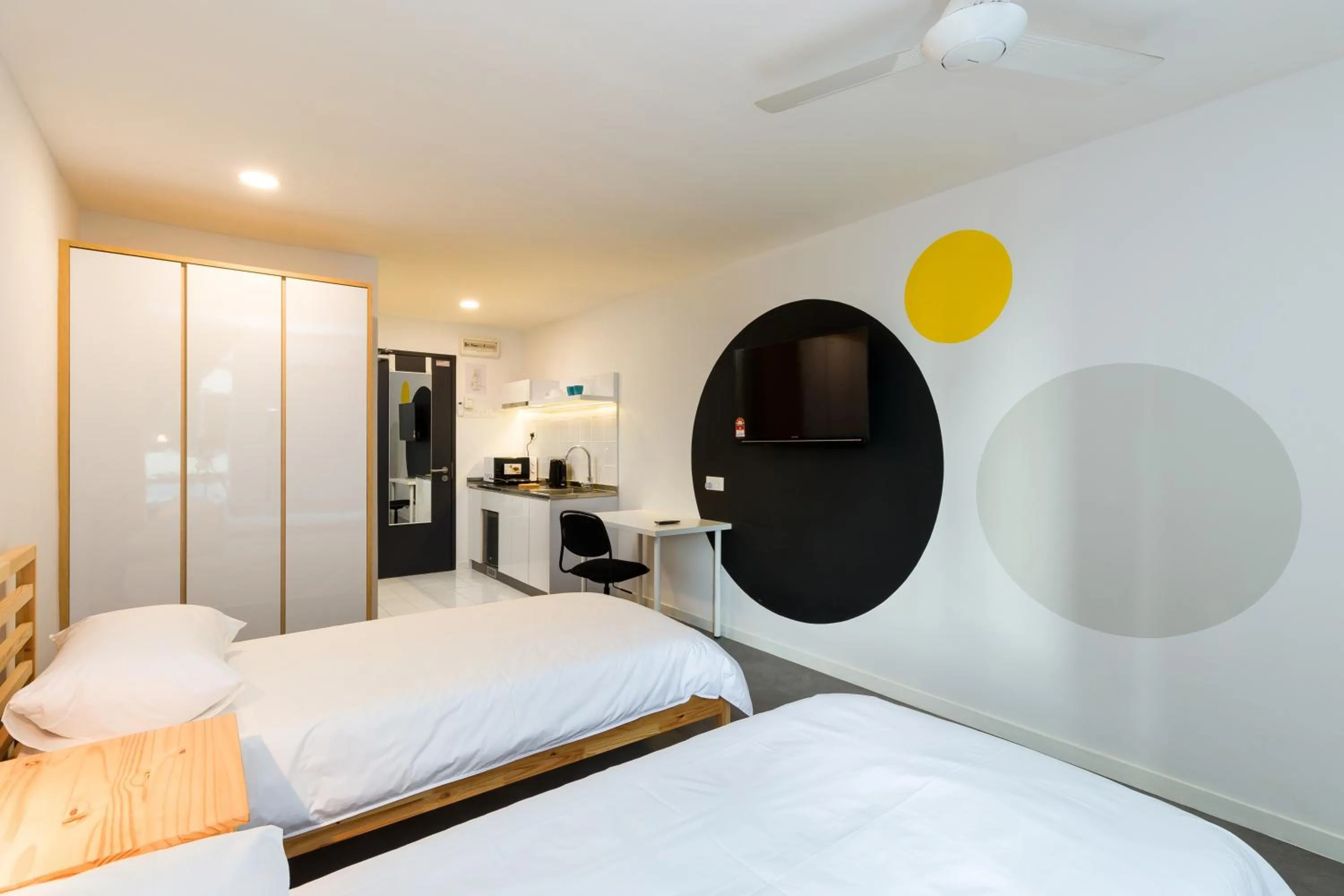 Bed in Upstairs Downstairs CoLiving Kampung Pandan