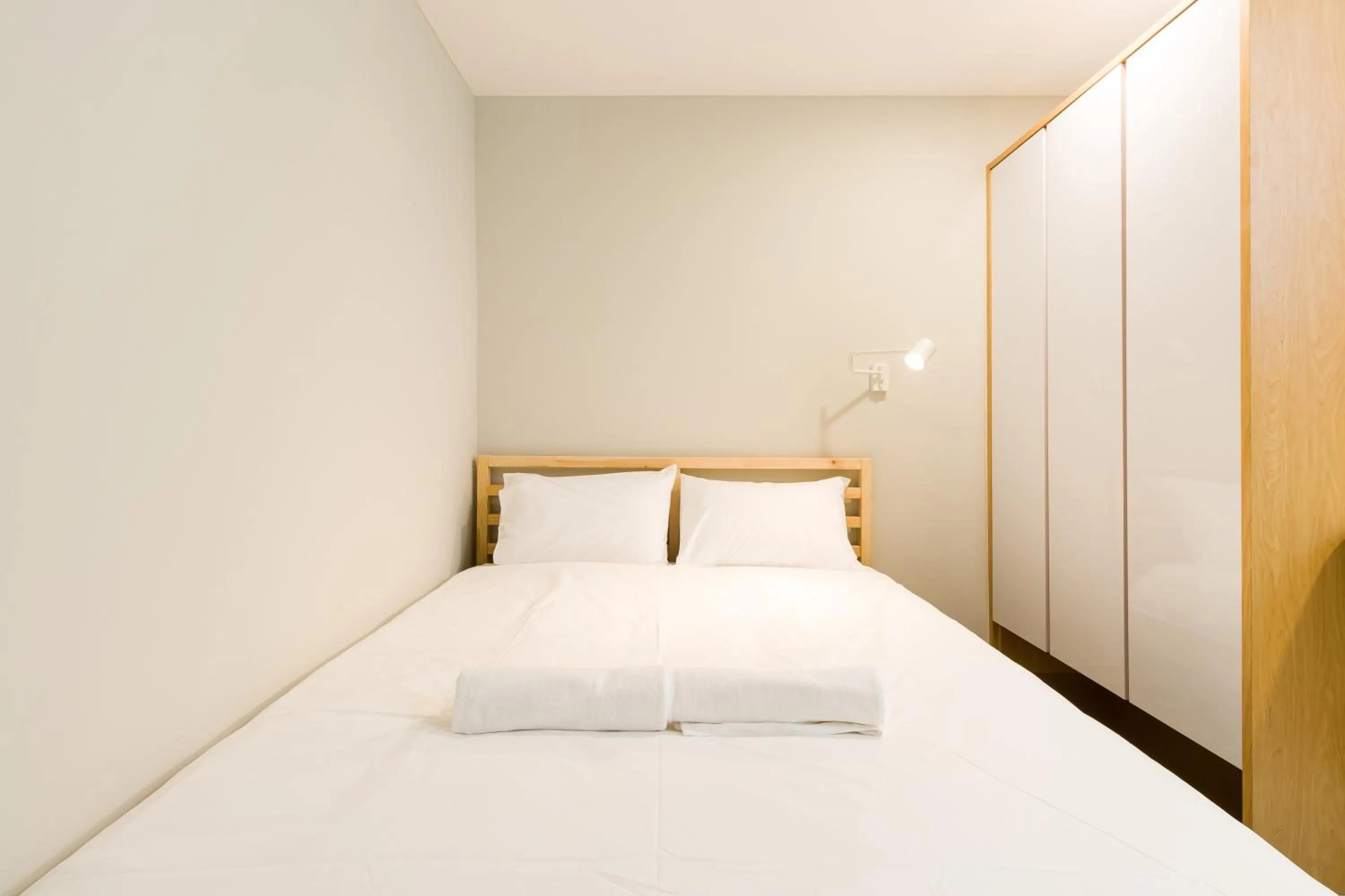 Bed in Upstairs Downstairs CoLiving Kampung Pandan
