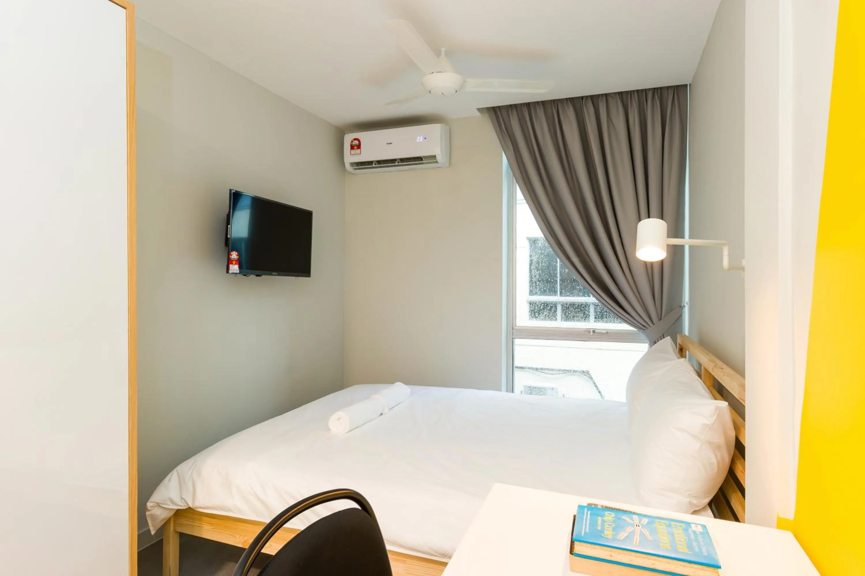 Bed in Upstairs Downstairs CoLiving Kampung Pandan