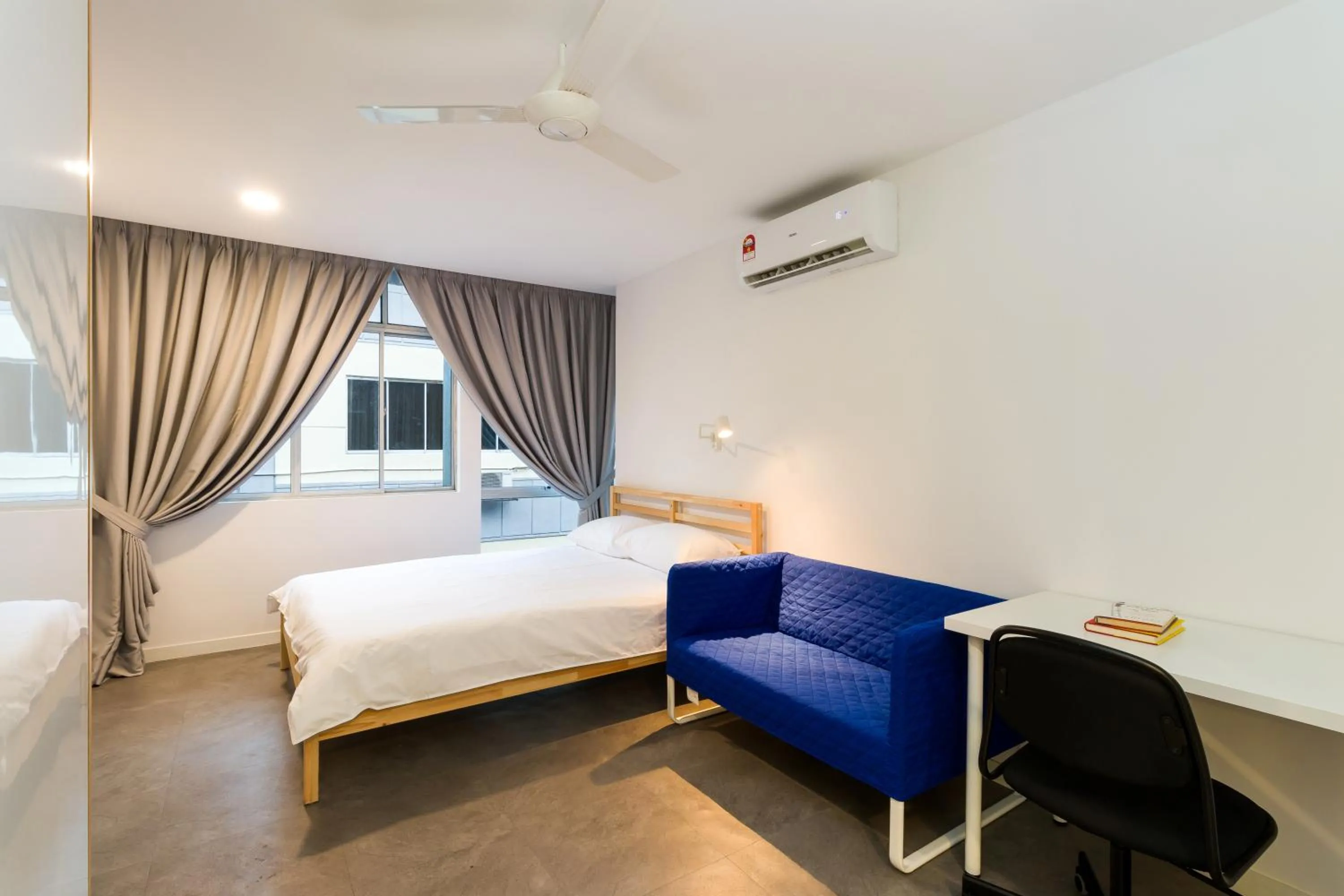 Bed in Upstairs Downstairs CoLiving Kampung Pandan
