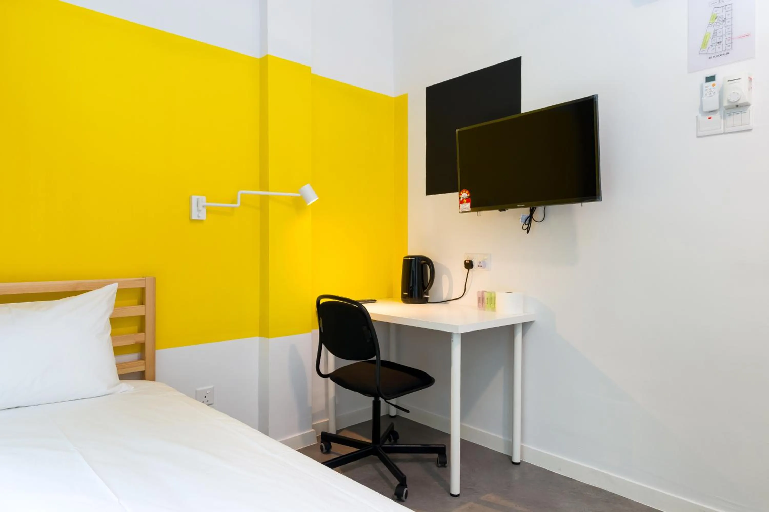 Bed in Upstairs Downstairs CoLiving Kampung Pandan