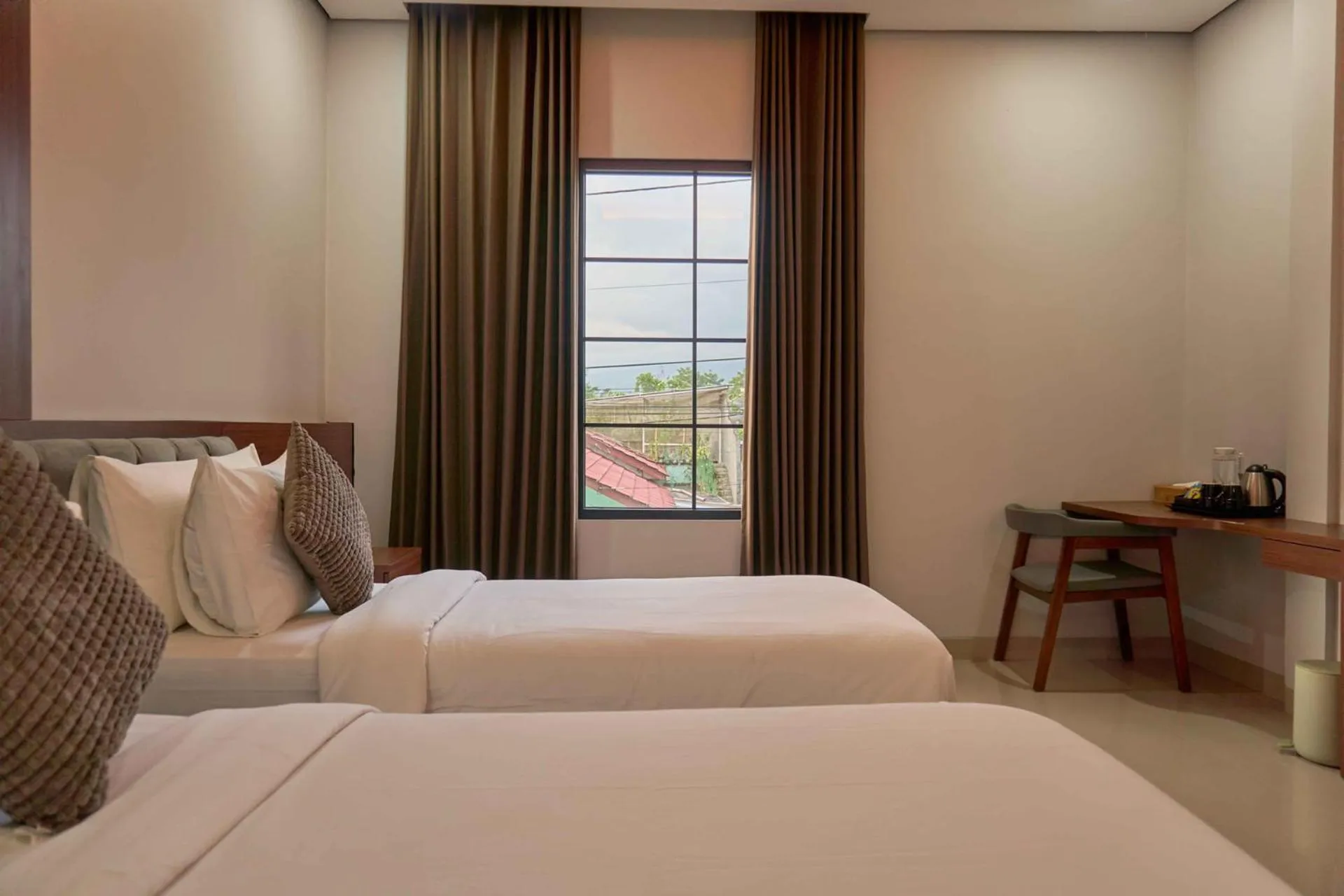 Bed in Sakanti Inn Wonosobo