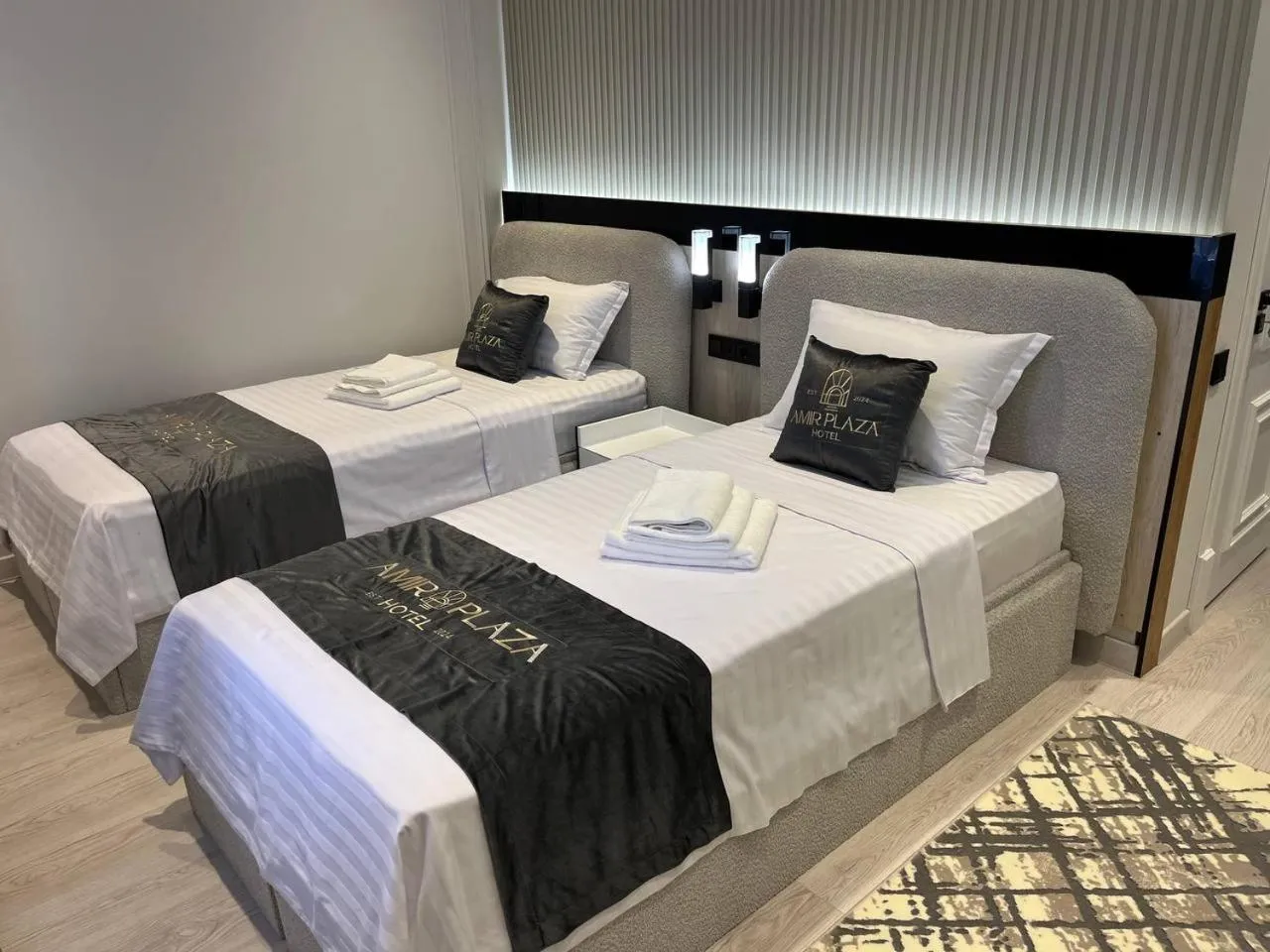 Bed in AMIR PLAZA hotel