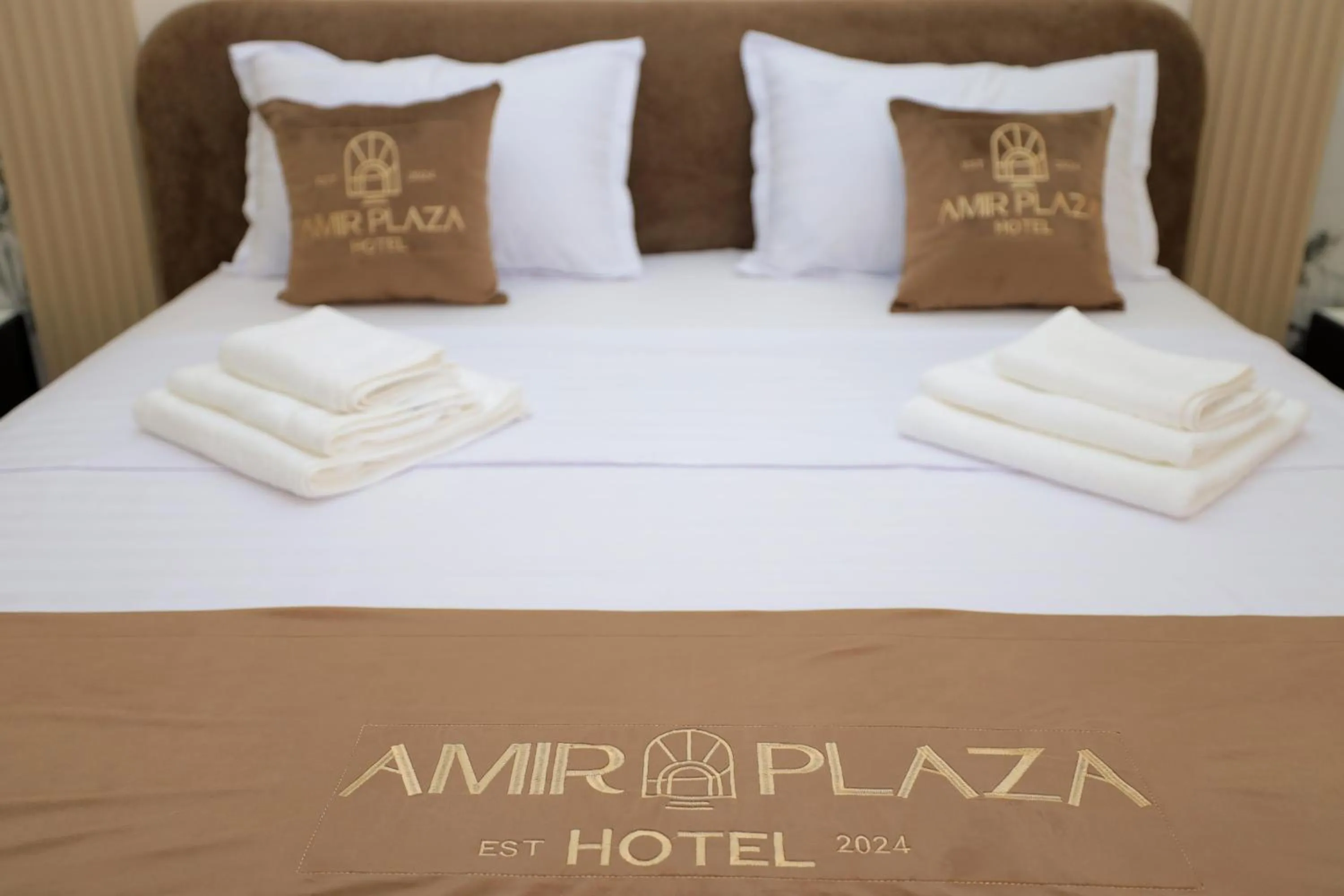 Bed in AMIR PLAZA hotel