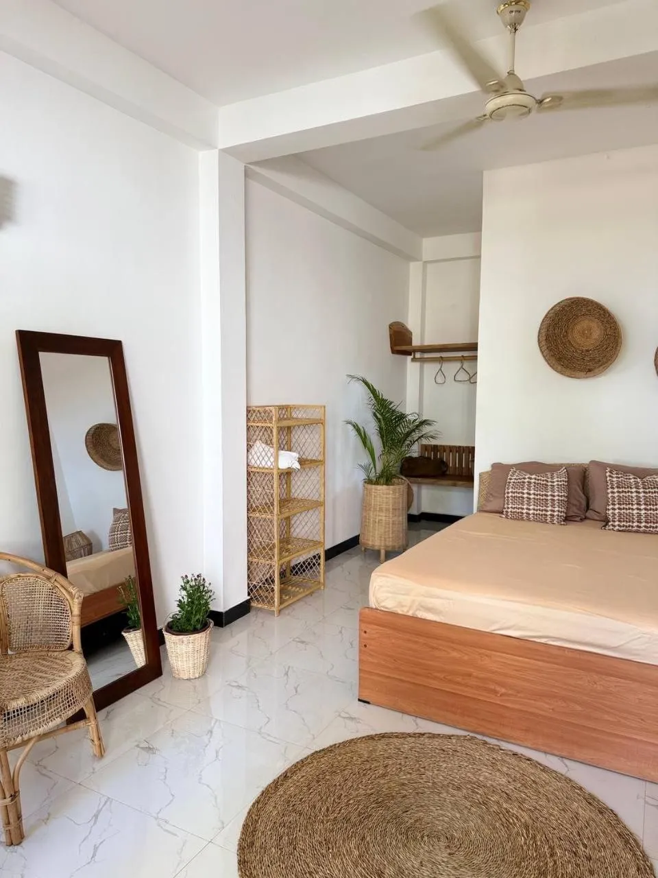 Bed in Coconut Palm beach restaurant and rooms