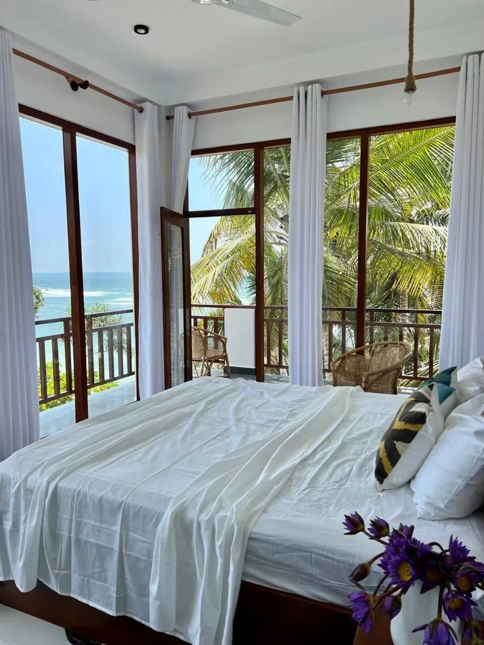 Bed in Coconut Palm beach restaurant and rooms