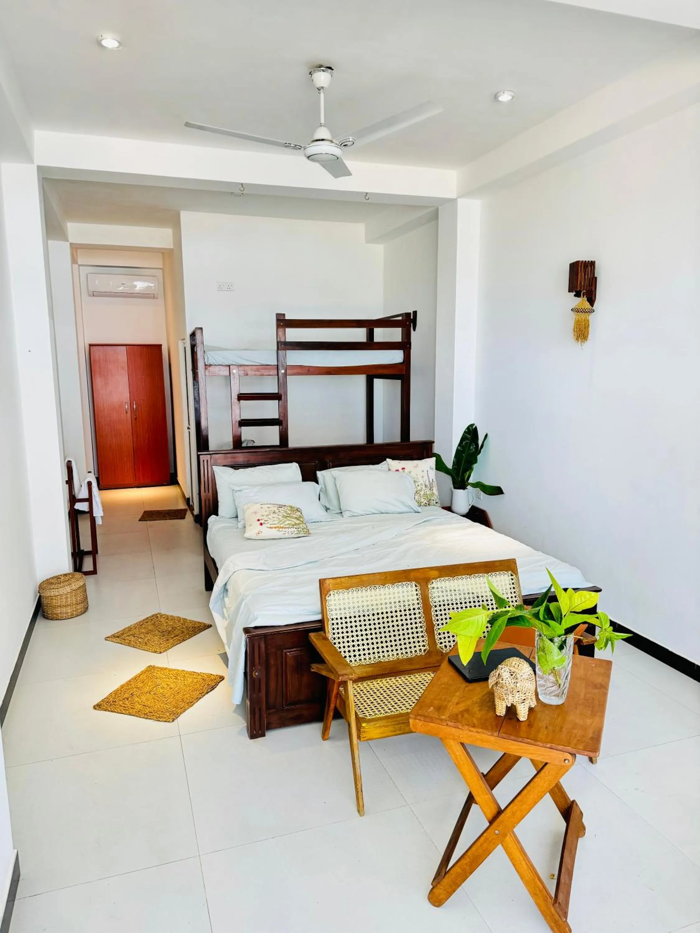 Bed in Coconut Palm beach restaurant and rooms