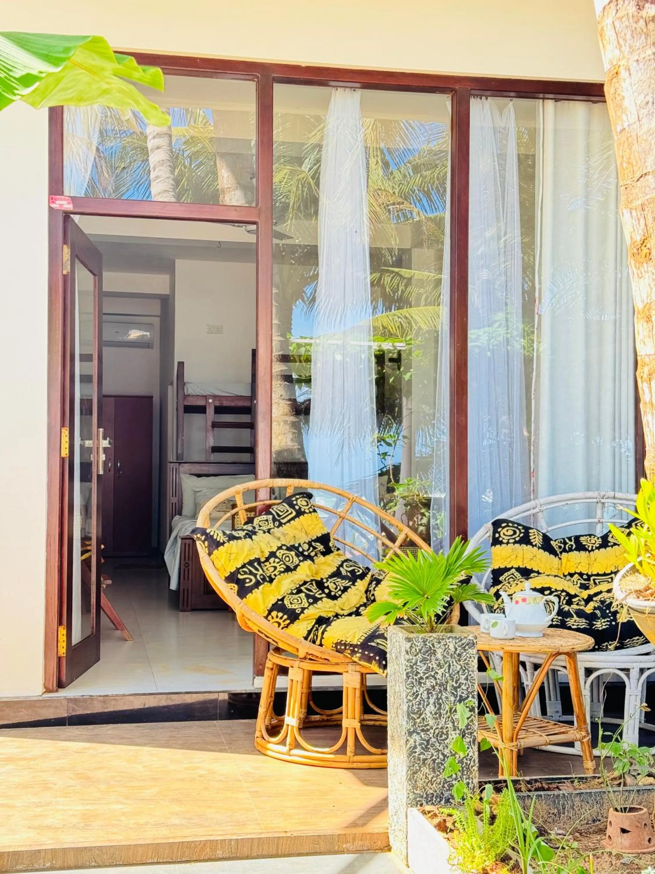 Day in Coconut Palm beach restaurant and rooms