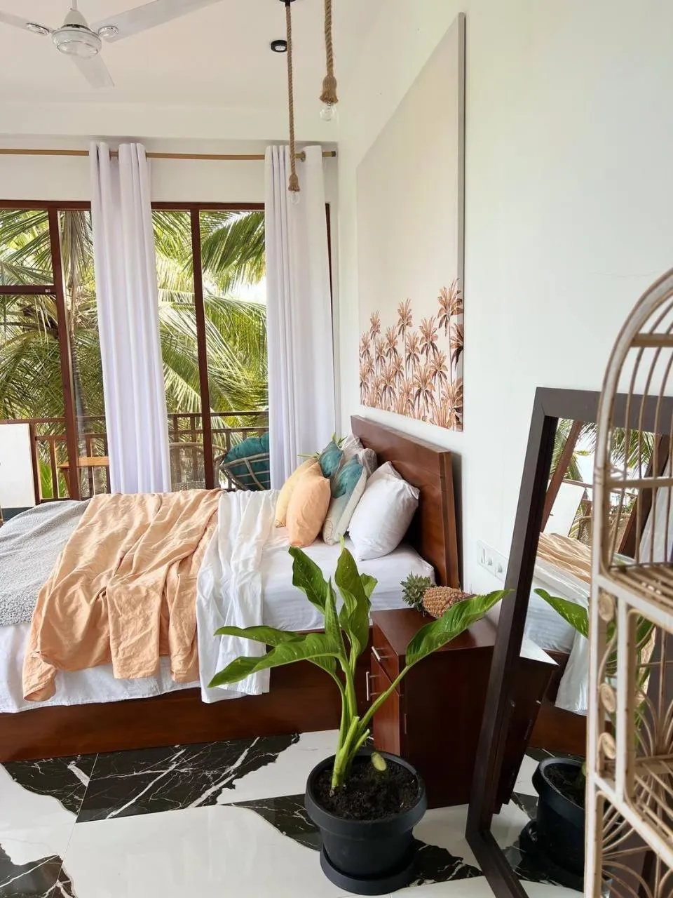 Bed in Coconut Palm beach restaurant and rooms