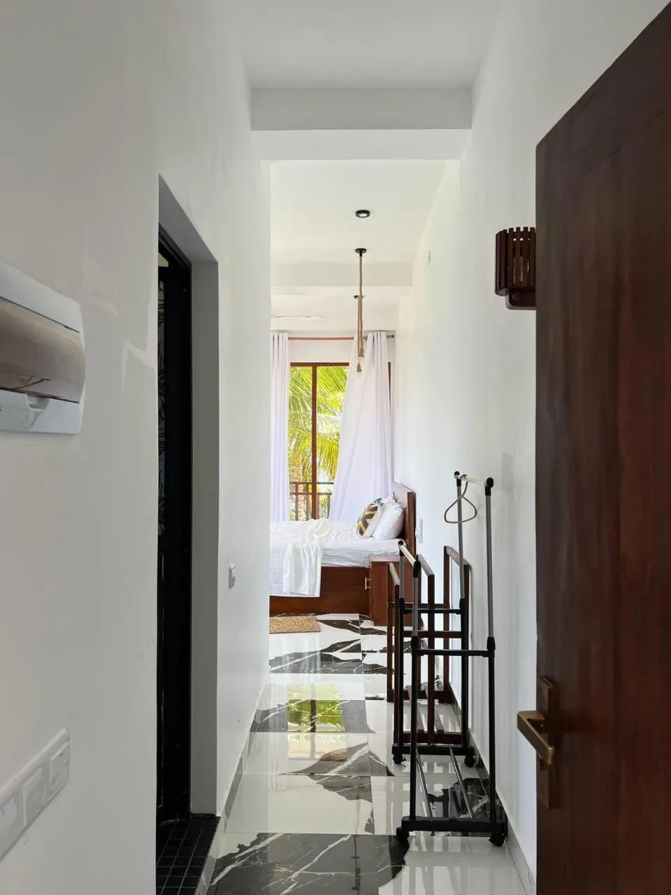 Bed in Coconut Palm beach restaurant and rooms