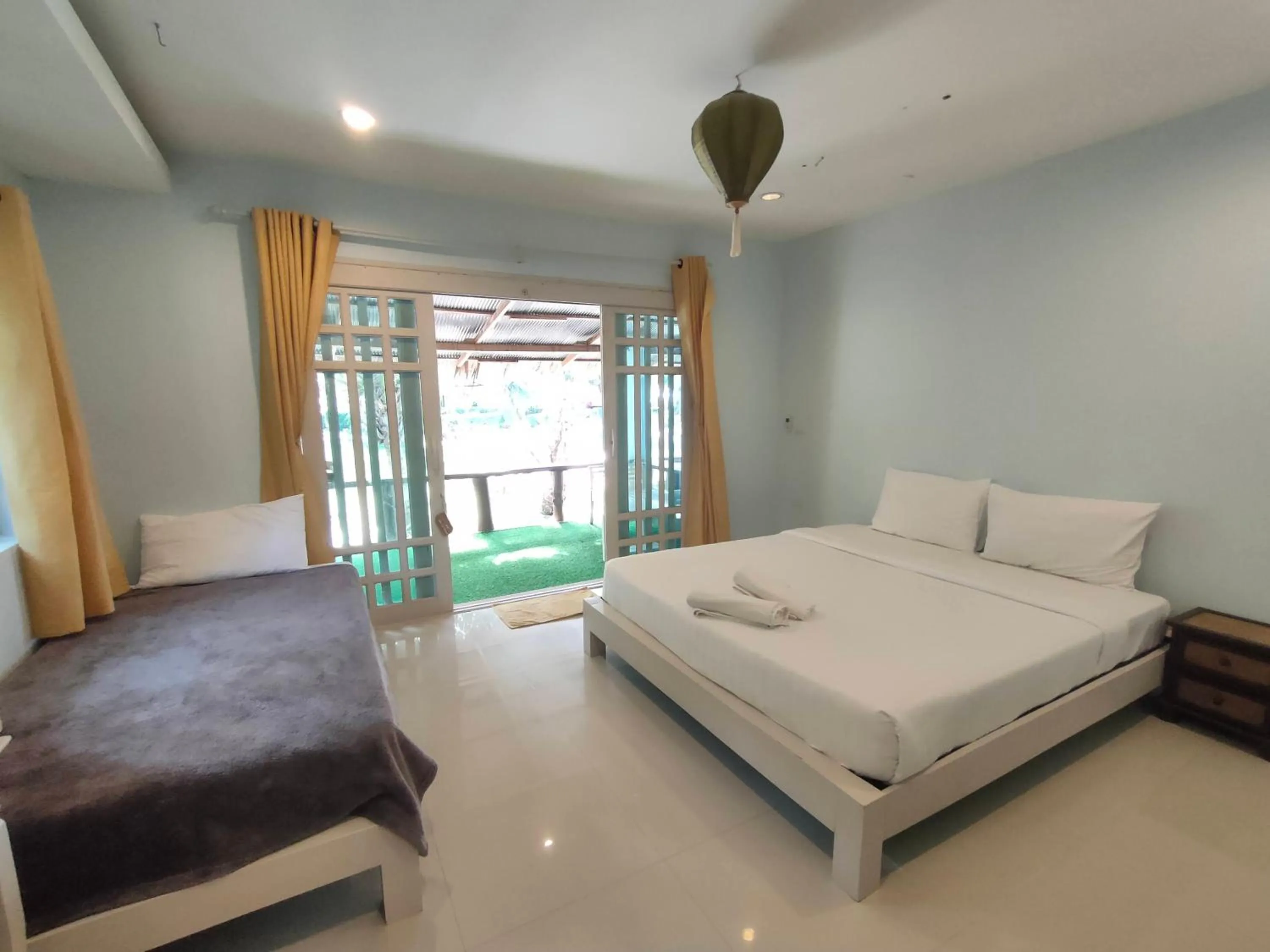 Bed in Banana Beach Resort