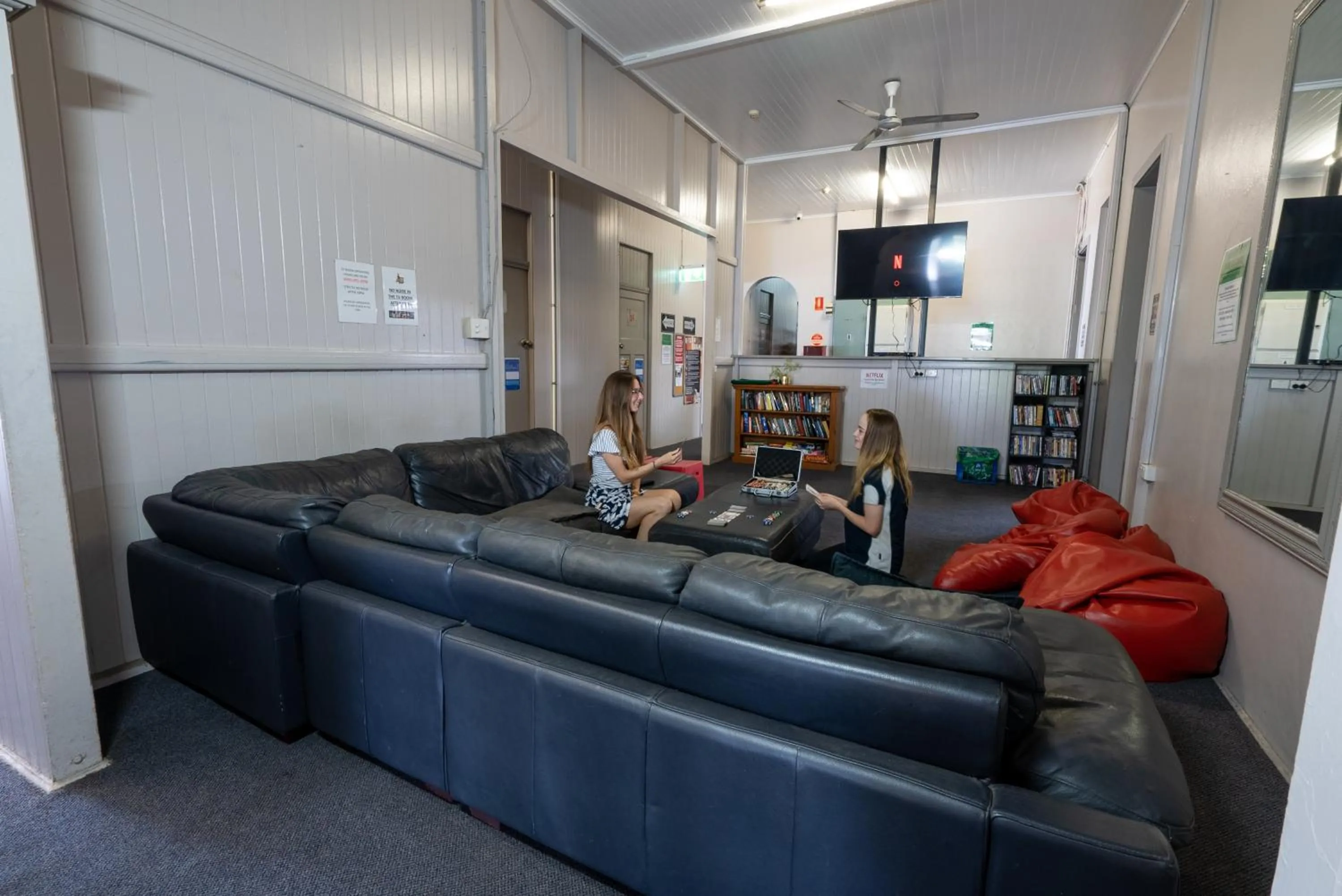 Communal lounge/ TV room in The Jack Backpackers