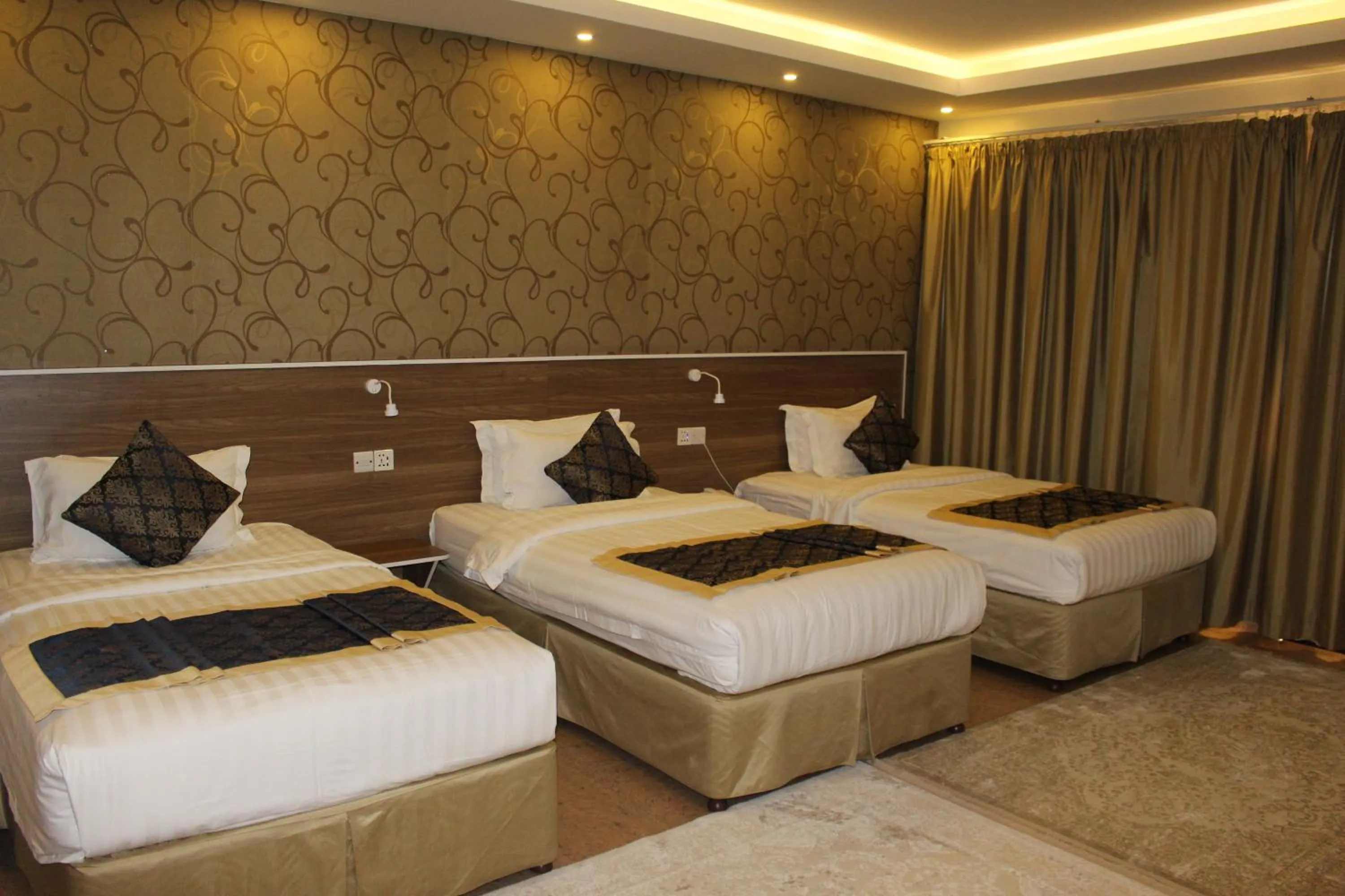 Bed in Al Diyar Hotel