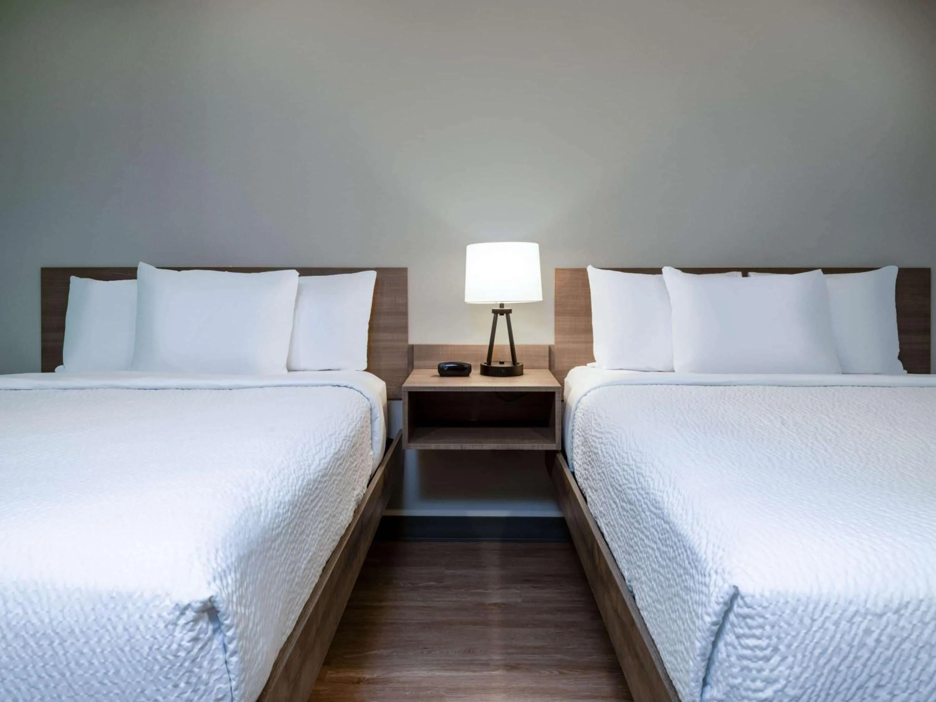 Photo of the whole room, Bed in ECHO Suites Extended Stay by Wyndham Indianapolis AmeriPlex