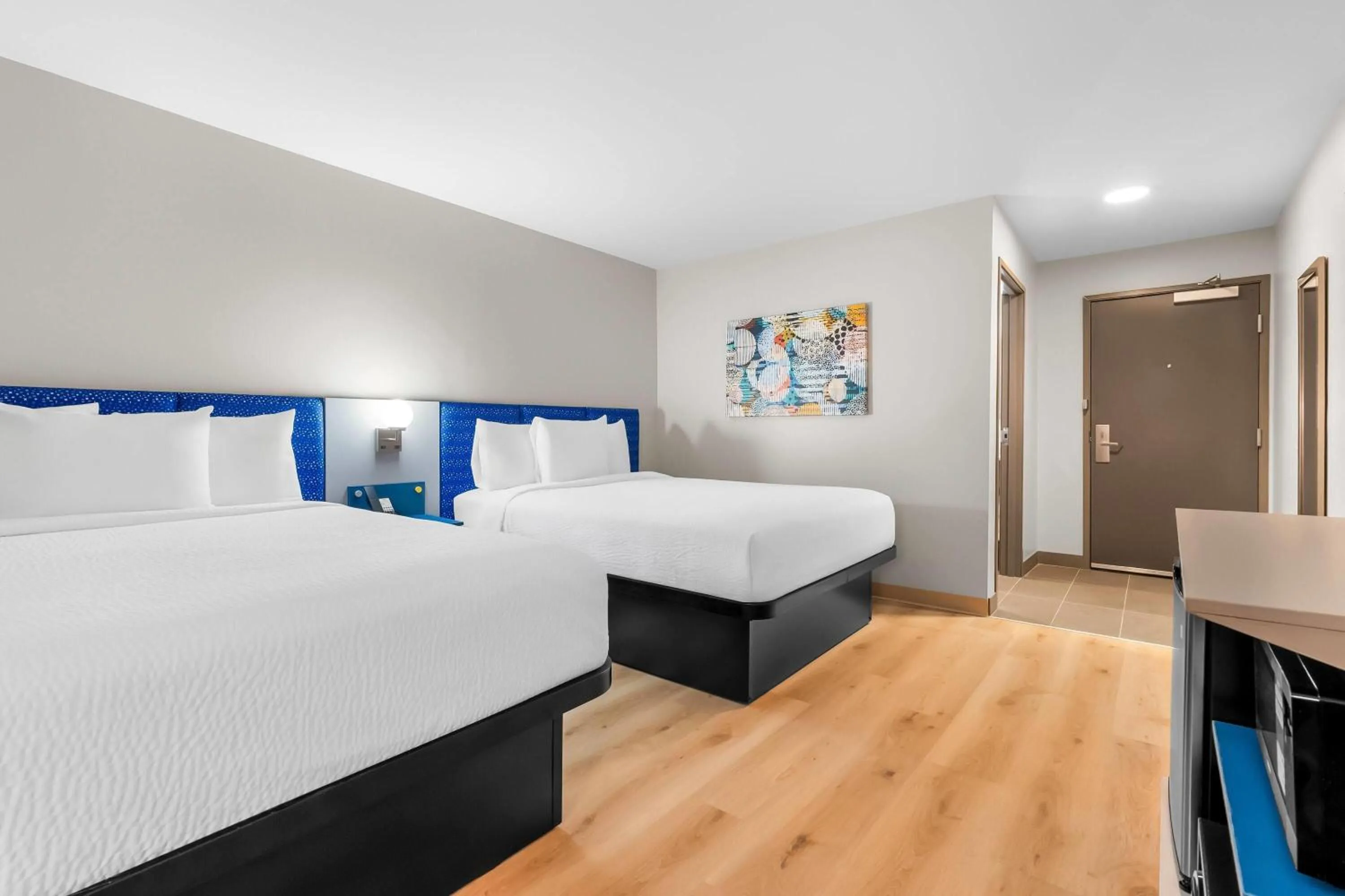 Bed in Microtel Inn & Suites by Wyndham Prattville Montgomery