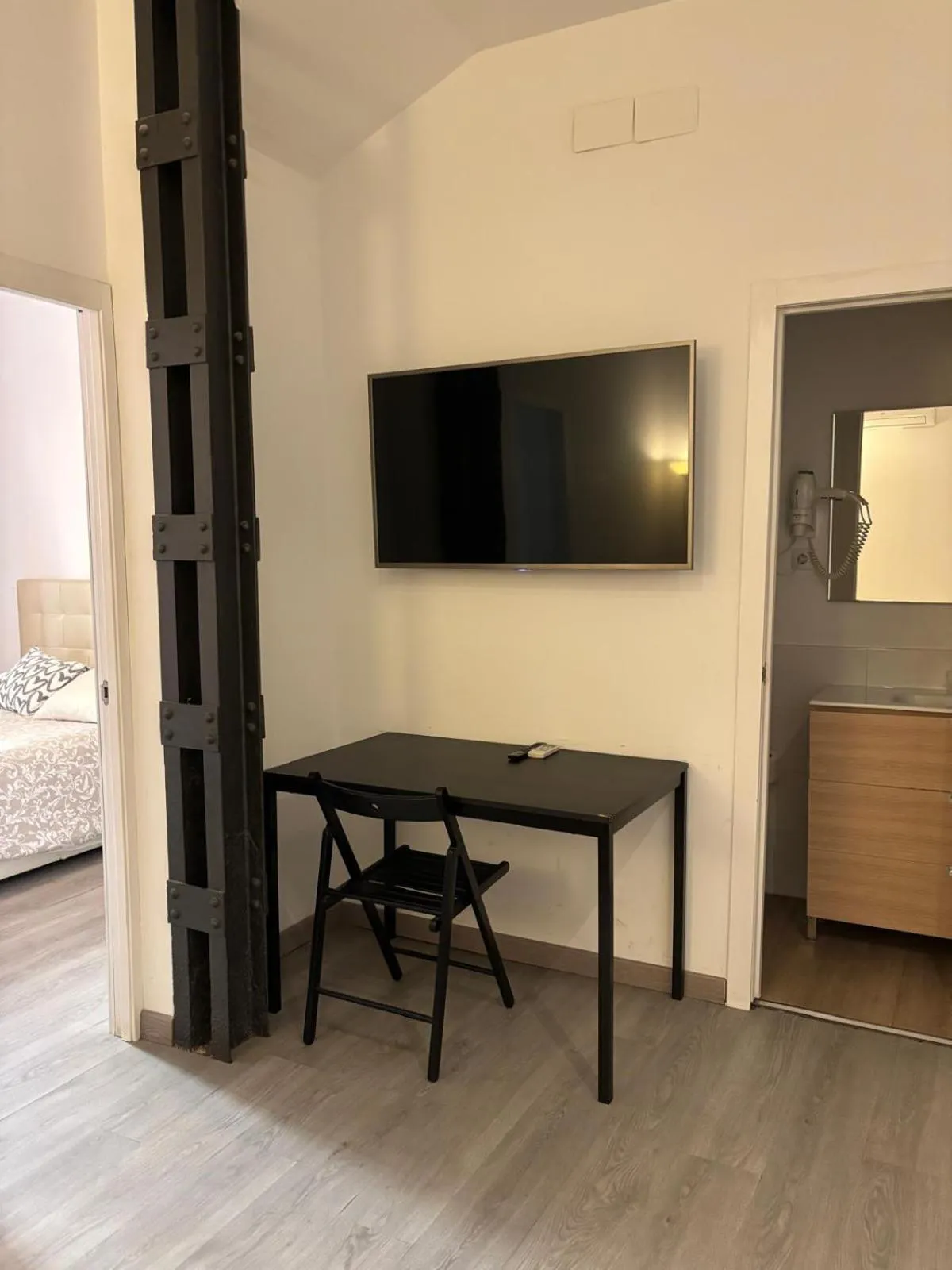 TV and multimedia, Bed in Hostal Goyal Pizarro