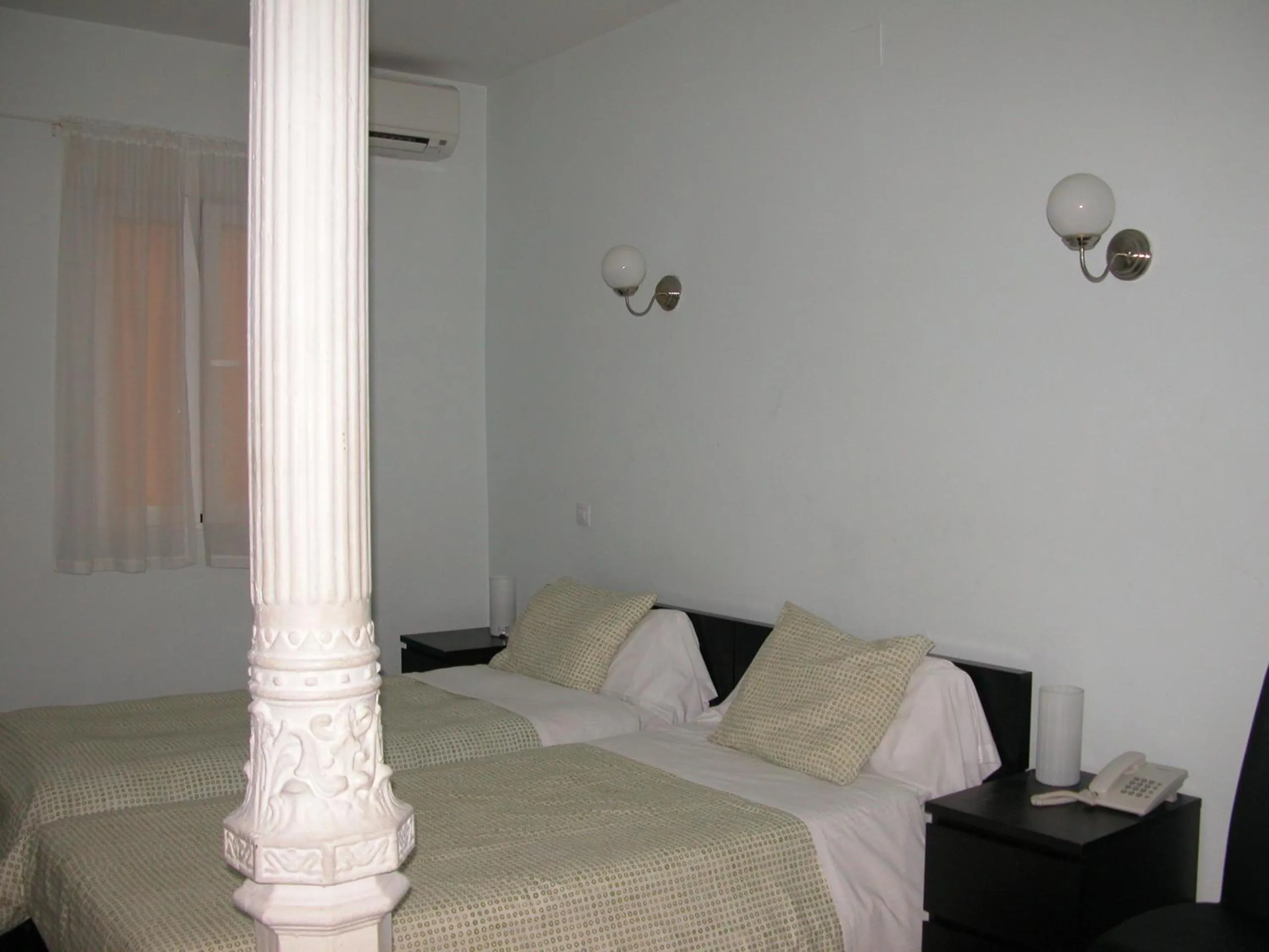 Photo of the whole room, Bed in Hostal Goyal Pizarro